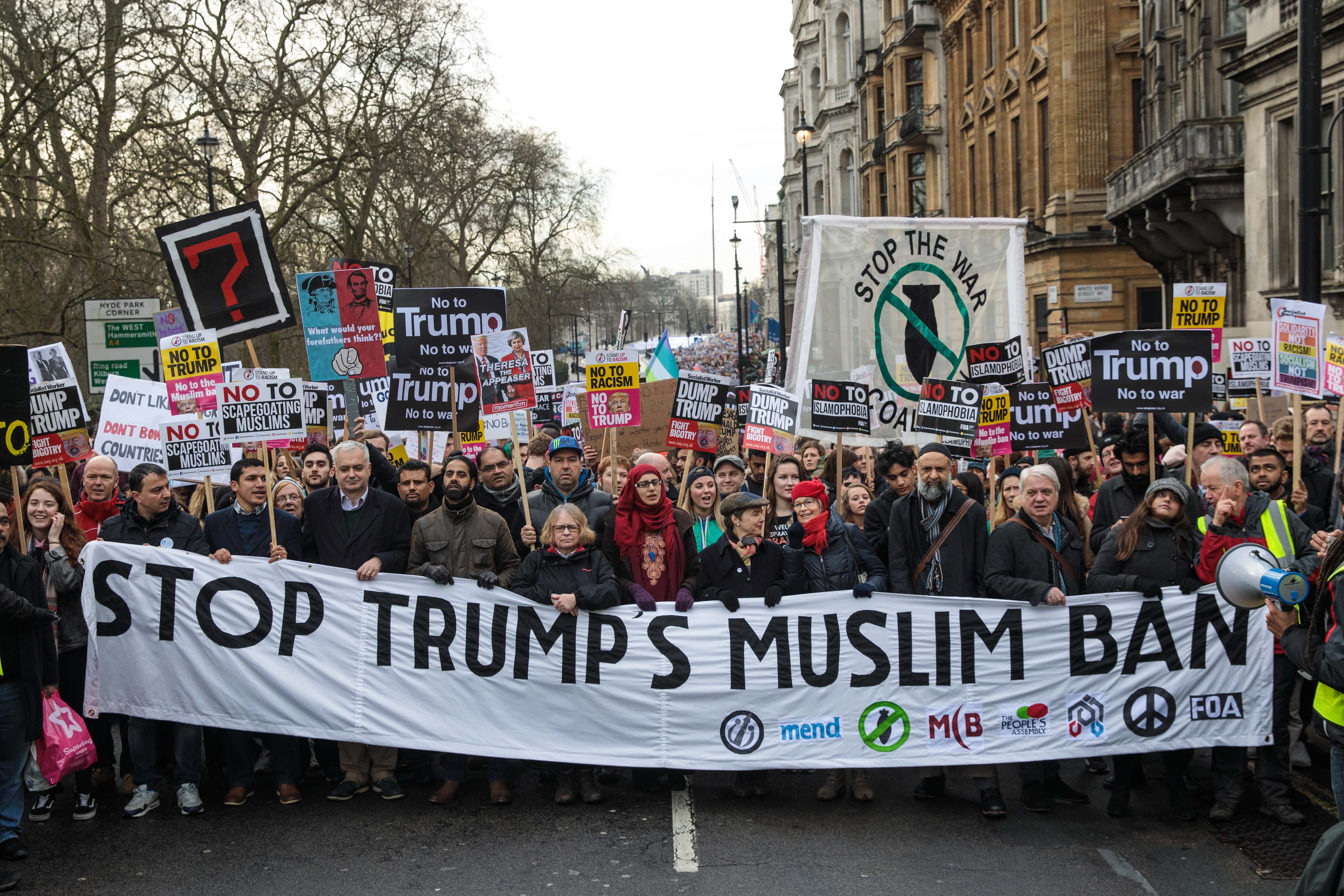 Thousands of protesters with banners and placards march through central London during a demonstration against U.S. President Donald Trump on February 4, 2017