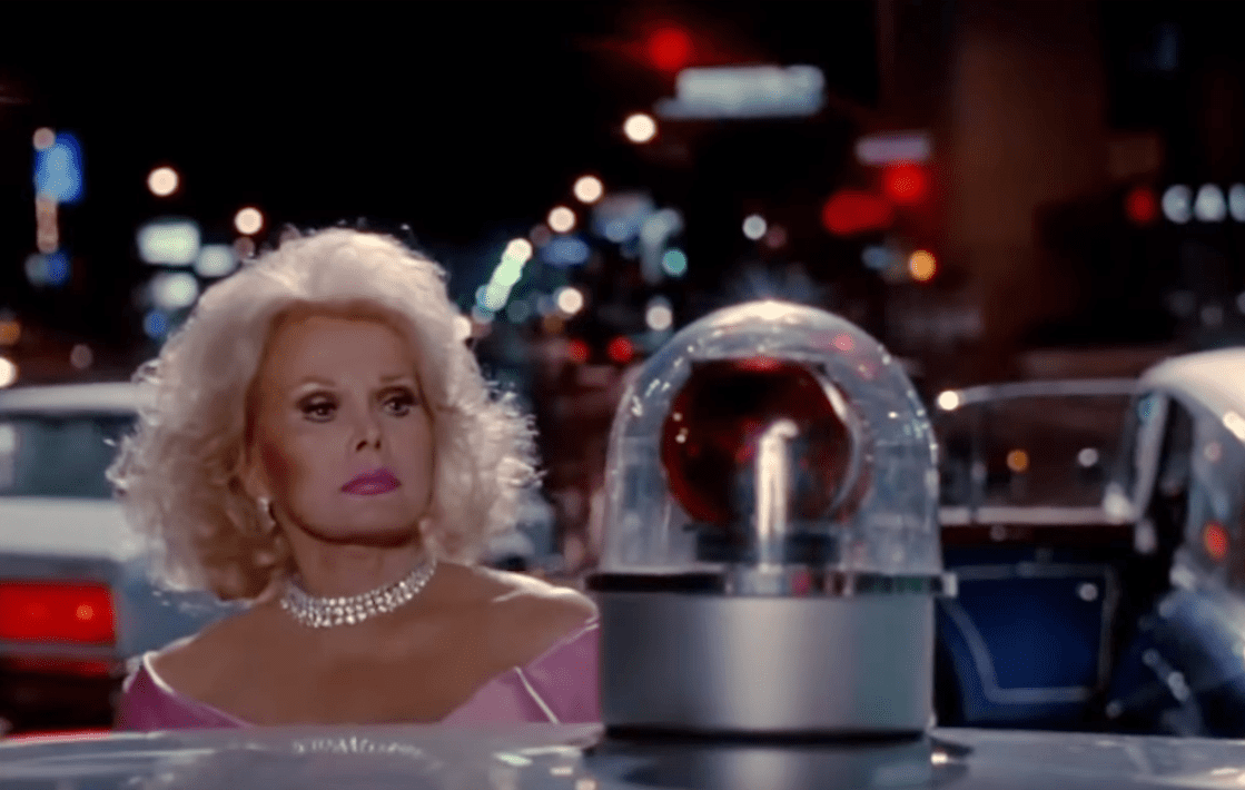 Zsa Zsa Gabor in pink dress