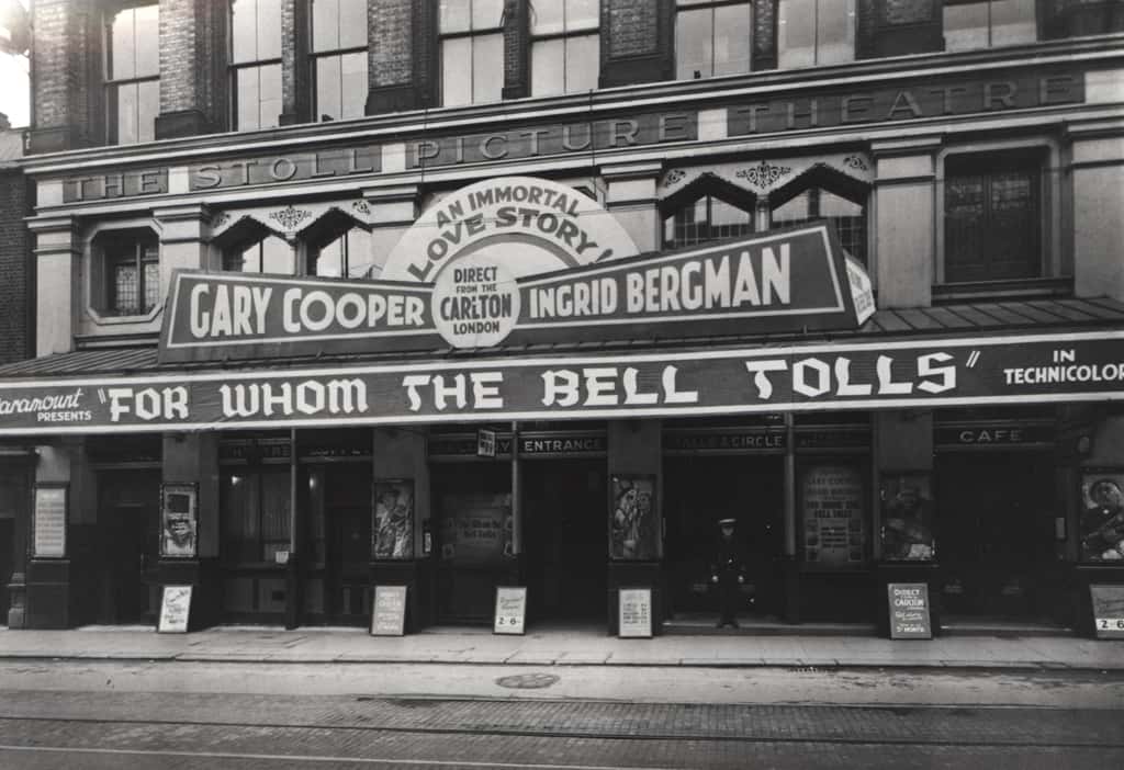 The cinema is showing 'For Whom the Bell Tolls' starring Gary Cooper and Ingrid Bergman.