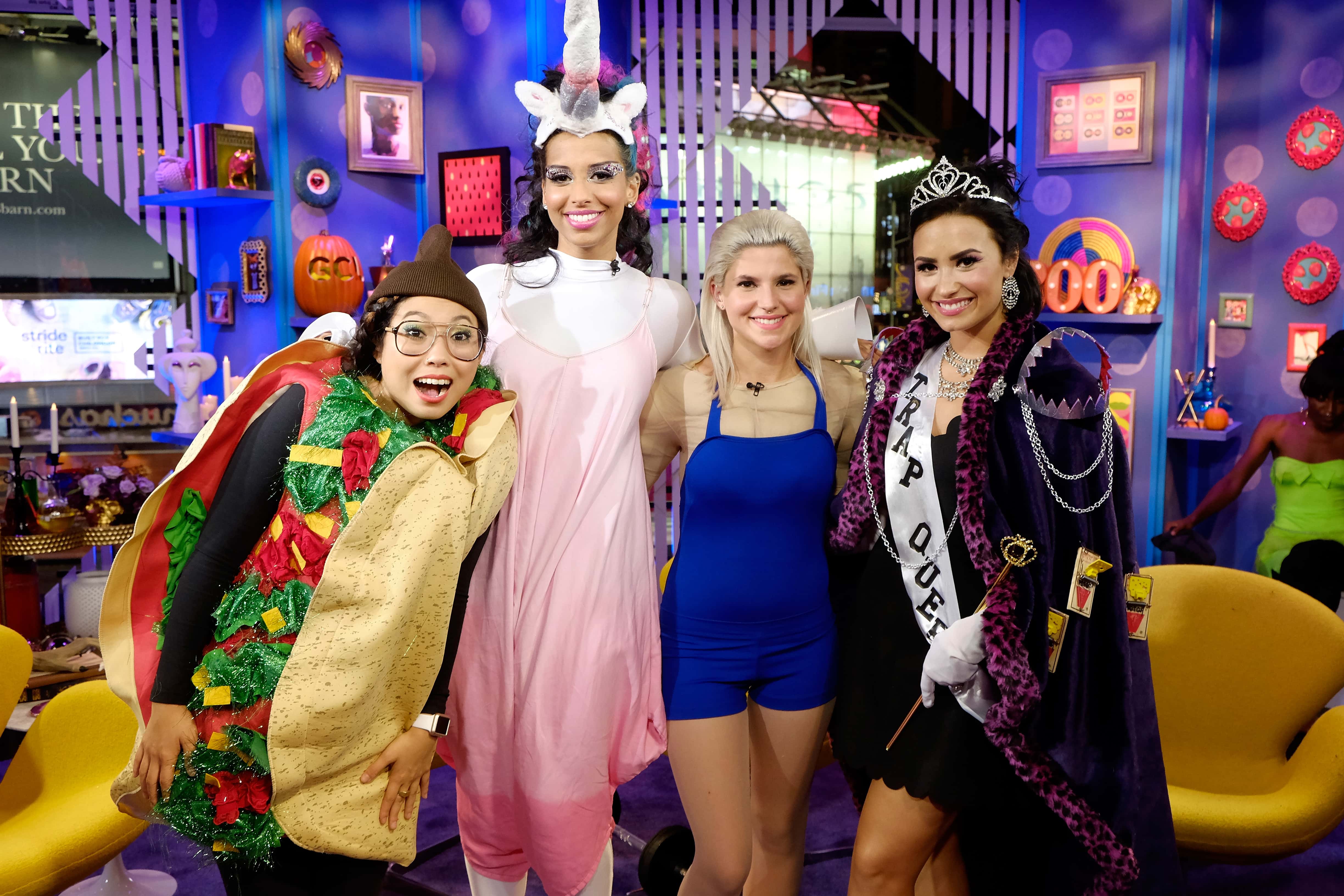Hosts Awkwafina, Nessa and Carly Aquilino speak with Singer Demi Lovato at MTV's "Girl Code Live"