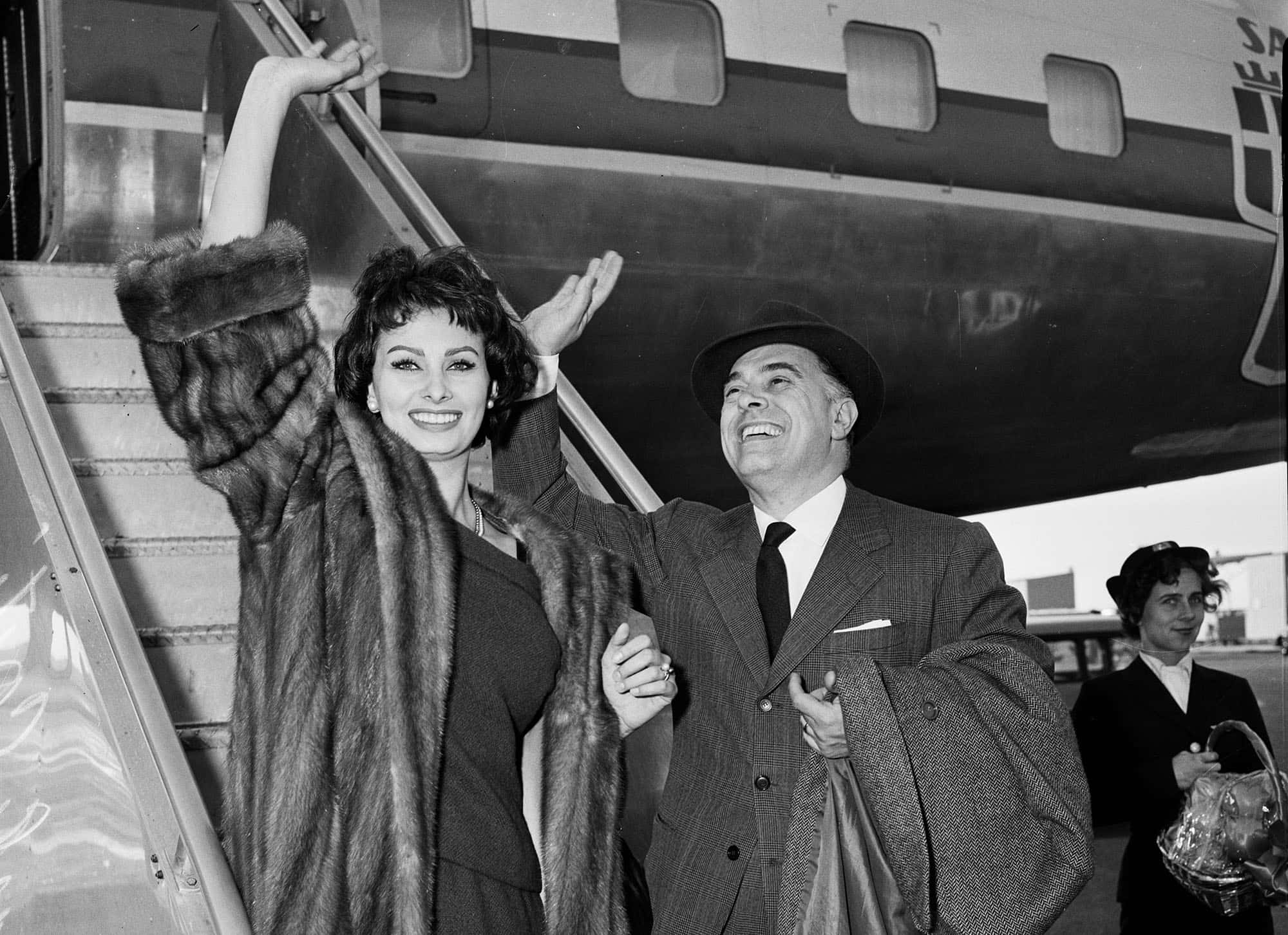 Sophia Loren arrives by air, upon arrival at International Airport 