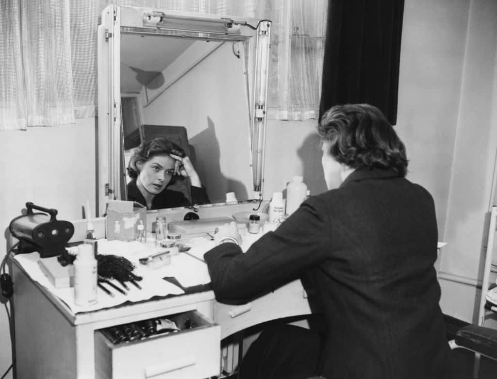 Ingrid Bergman at her dressing room in black outfit