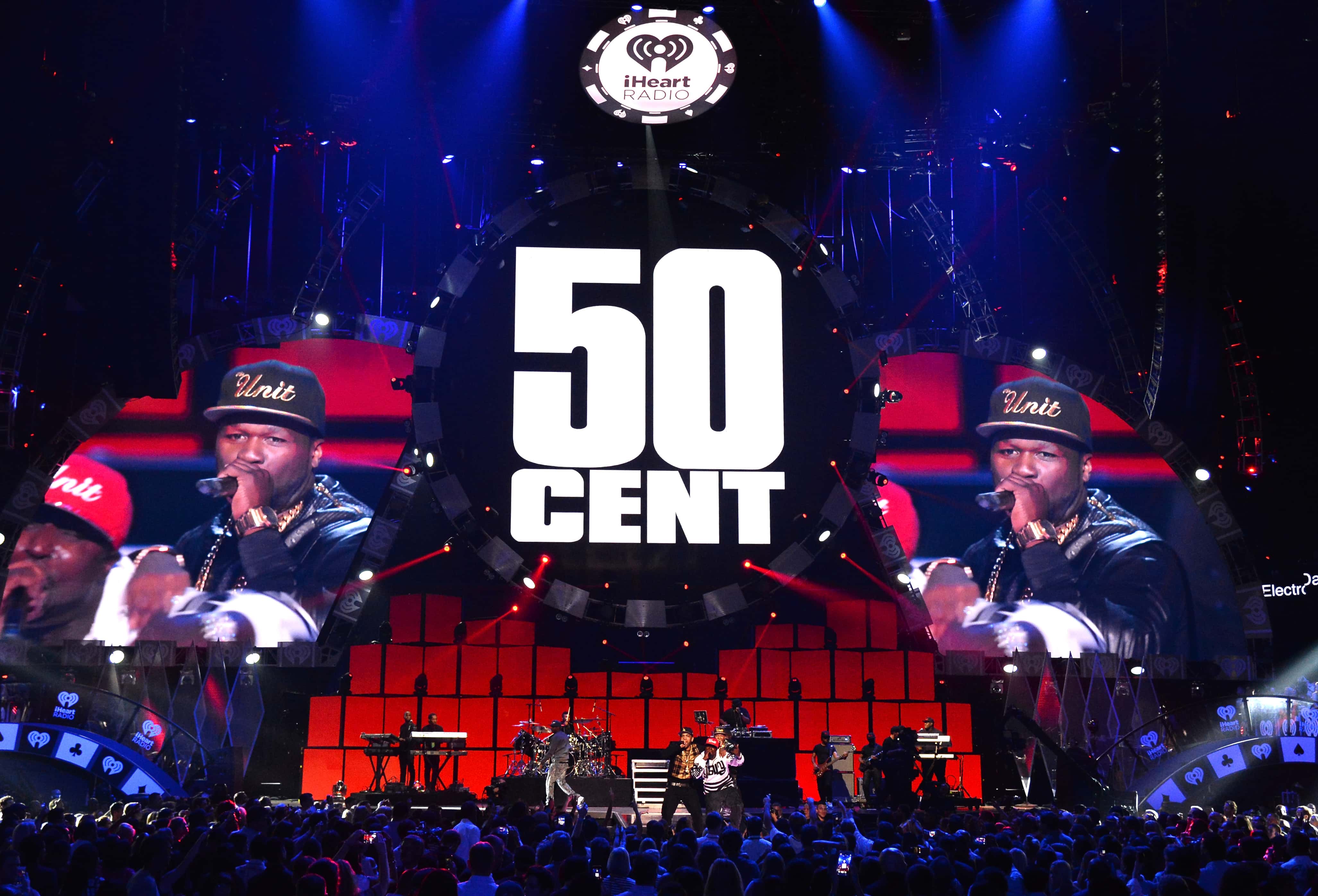 Rapper 50 Cent performs with G-Unit onstage
