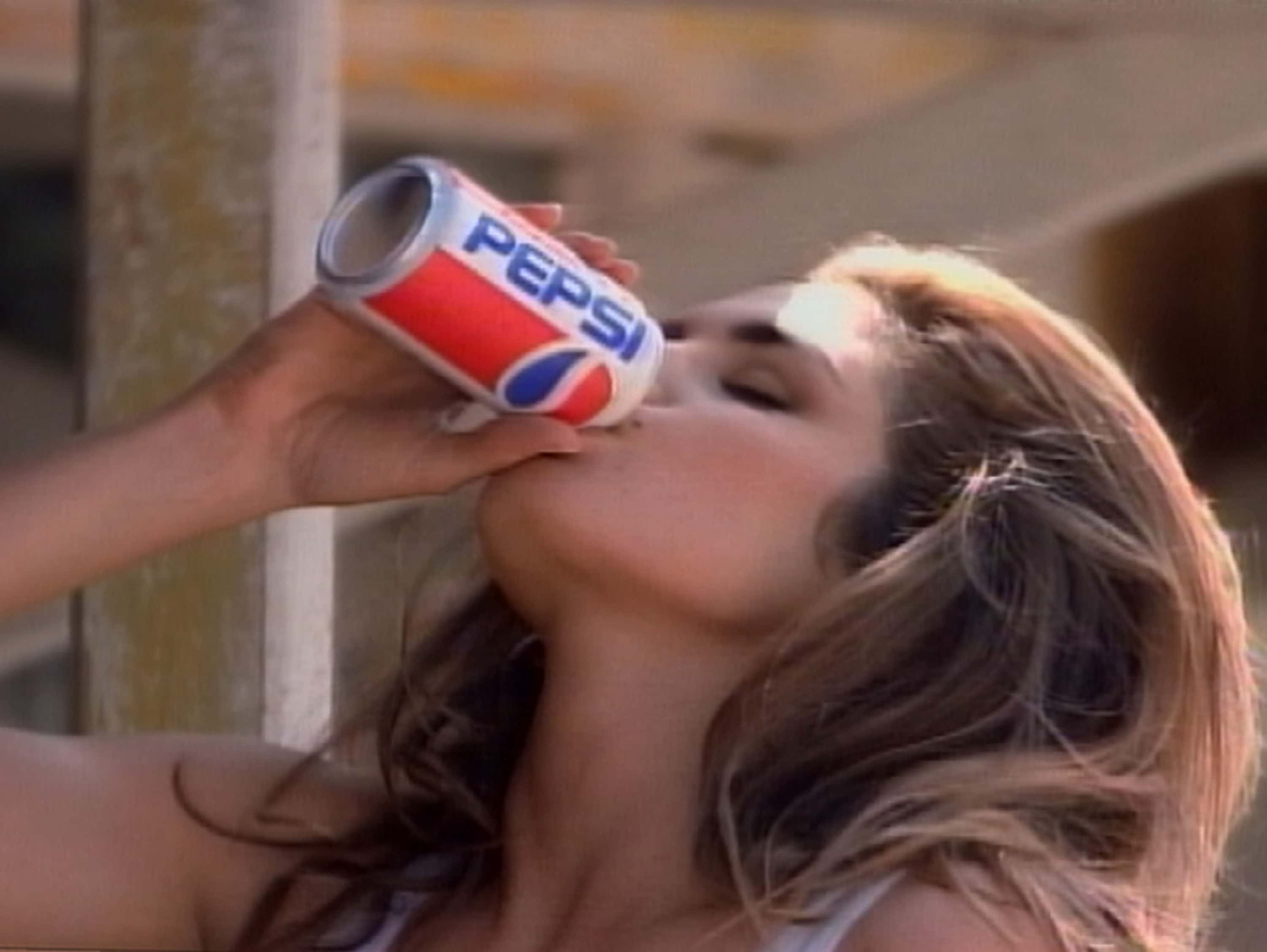 Supermodel Cindy Crawford drinks a Pepsi