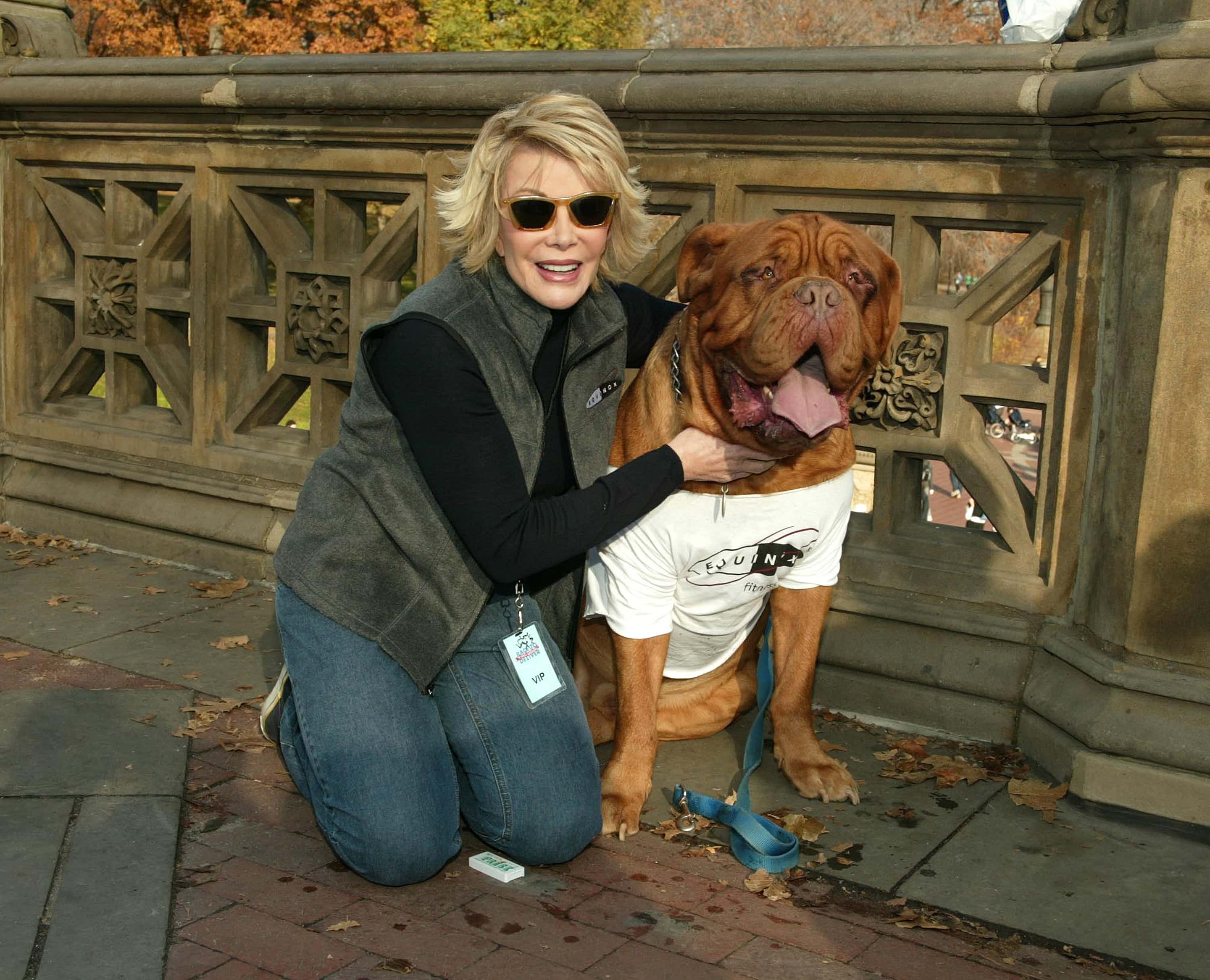 Joan Rivers and mascot Ben arrive at the10th annual Race To Deliver aids benefit