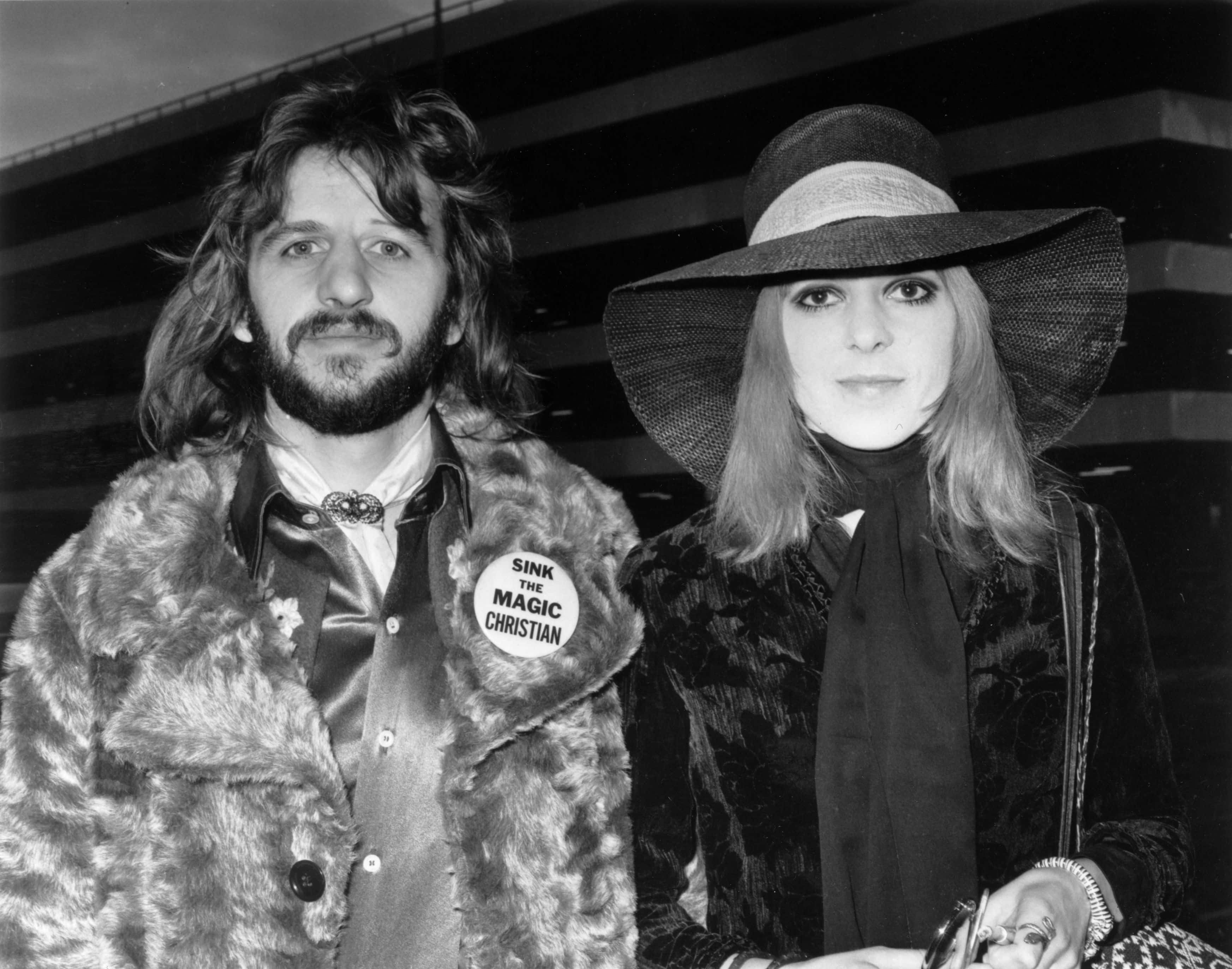 British pop star Ringo Starr with his first wife Maureen (1946 - 1994) at an airport.