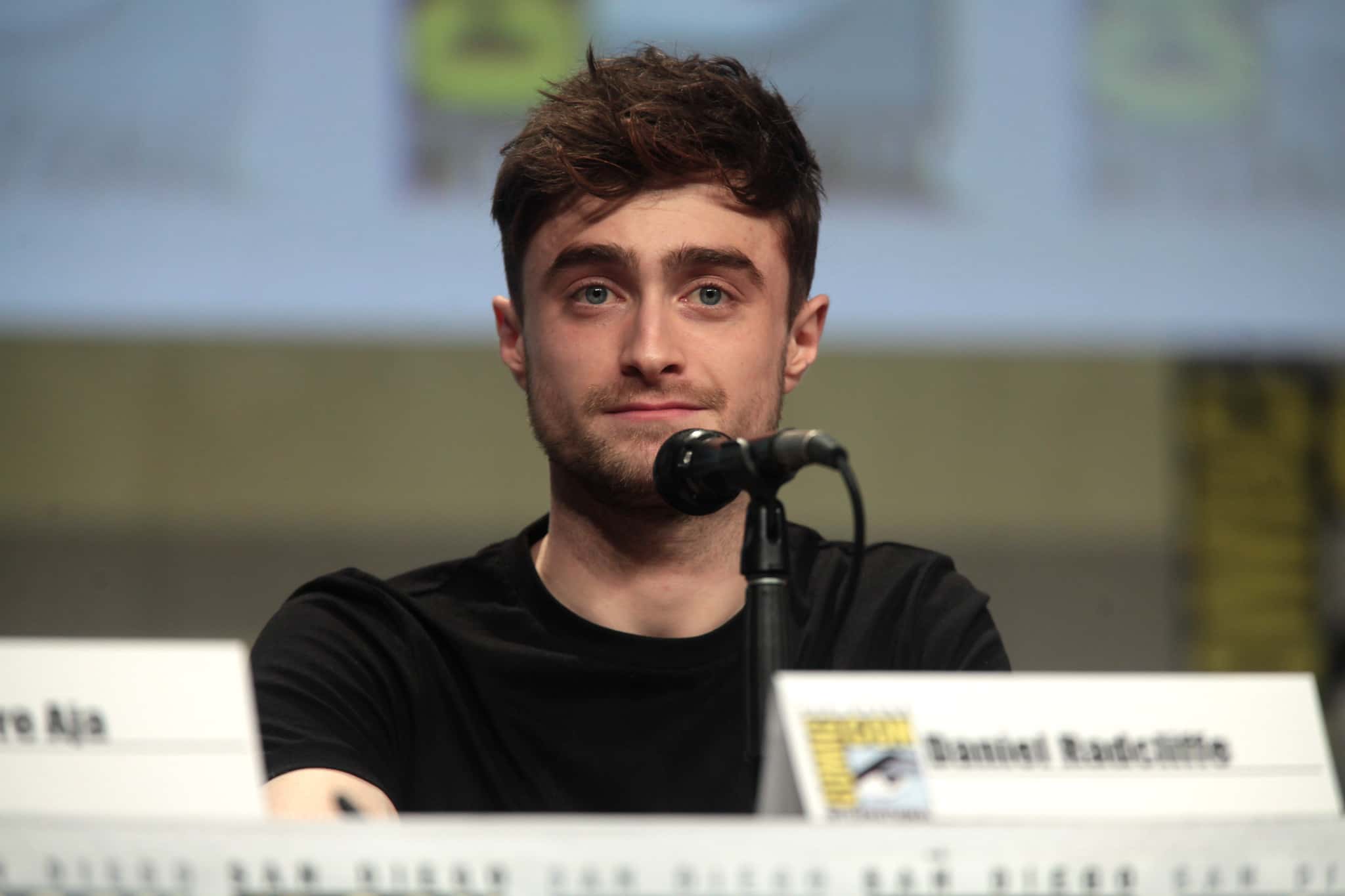 Daniel Radcliffe wearing a black t-shirt