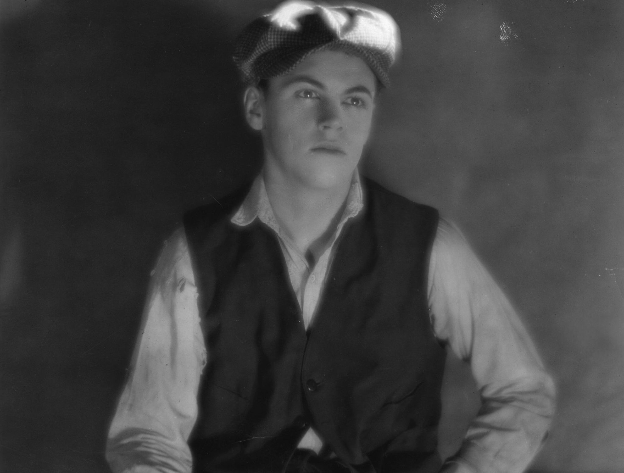 Ben Deeley in vest and a hat 
