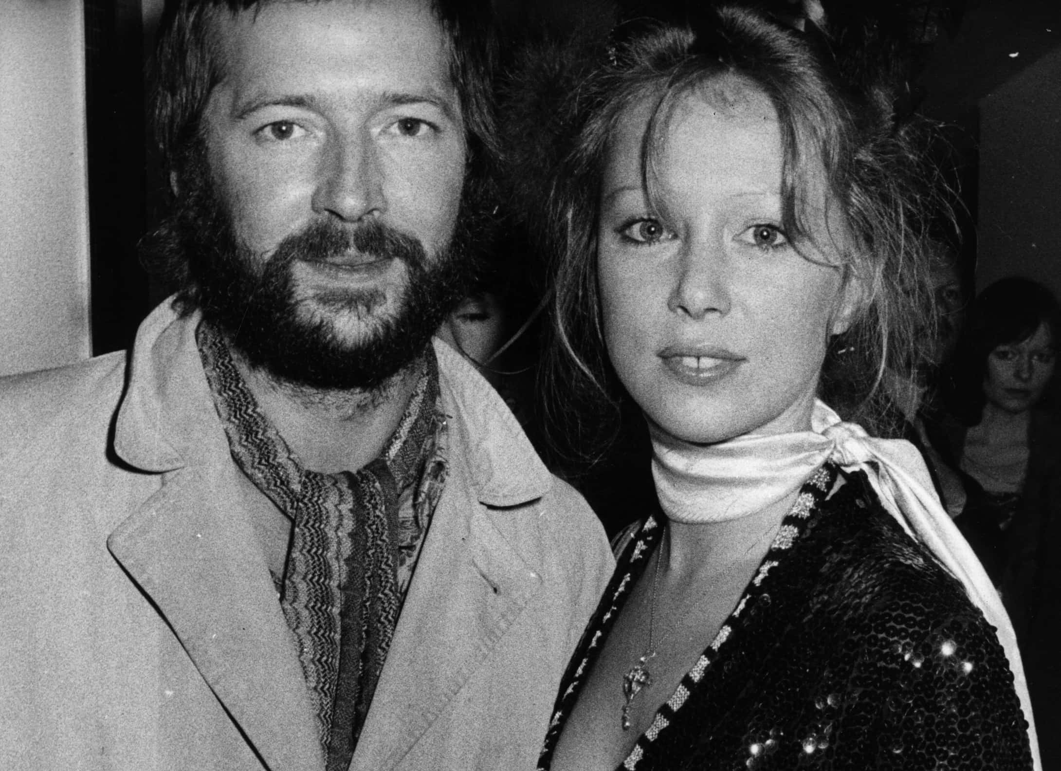 British blues-rock guitarist Eric Clapton and his girlfriend fashion model Patti Boyd, ex-wife of ex-Beatle George Harrison, pictured at the premiere of the rock musical film 'Tommy'