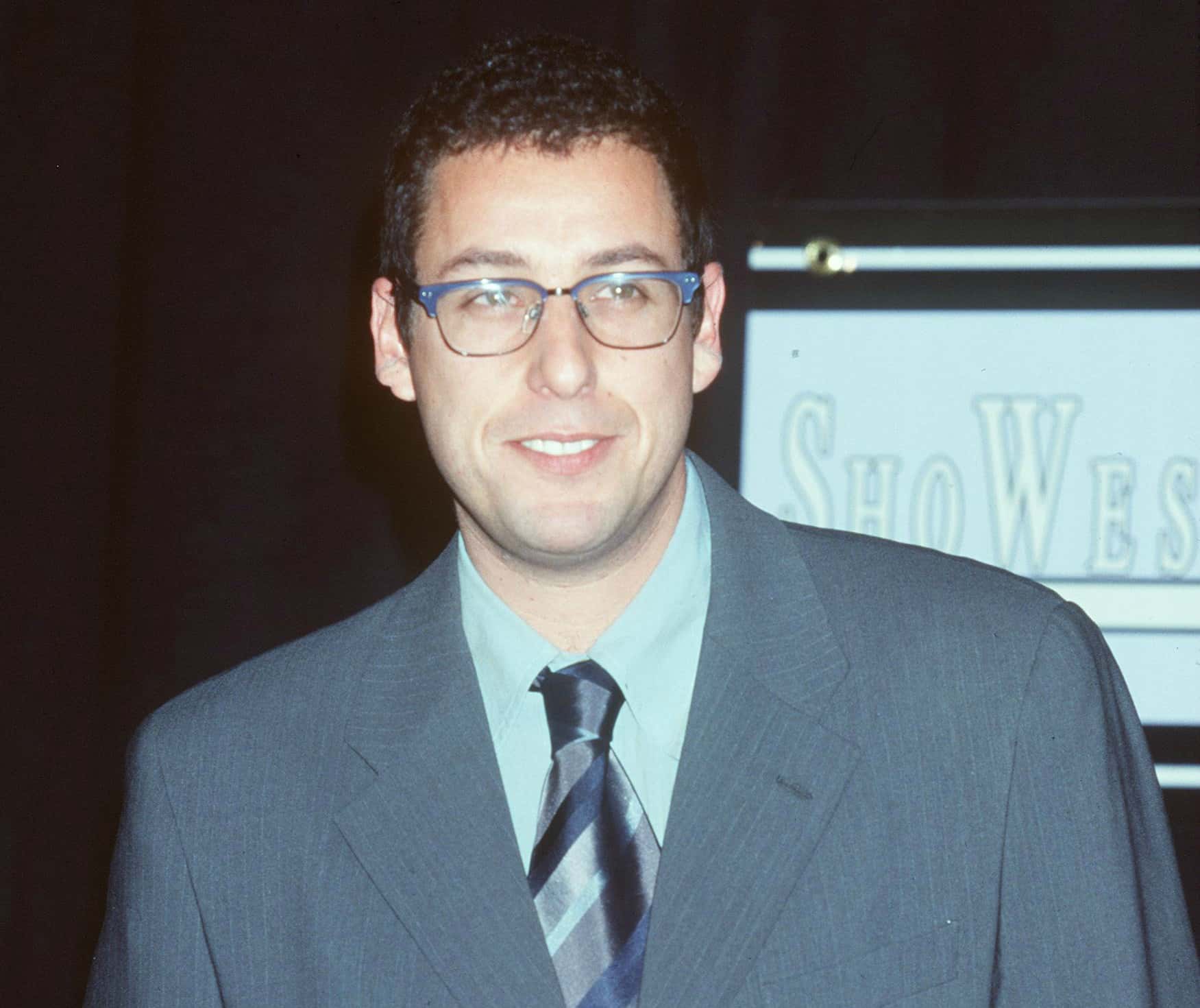  Adam Sandler wearing glasses