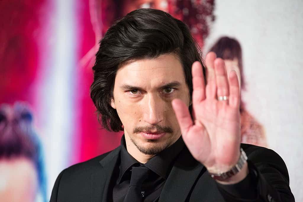 Portrait Photo of The American actor Adam Driver in dark outfit