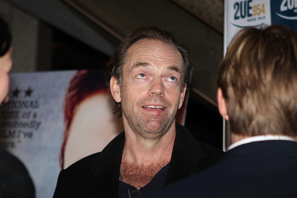 Portrait Photo of The actor Hugo Weaving in dark
