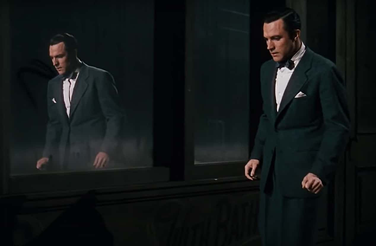 Gene Kelly in Cover Girl sad walking on street