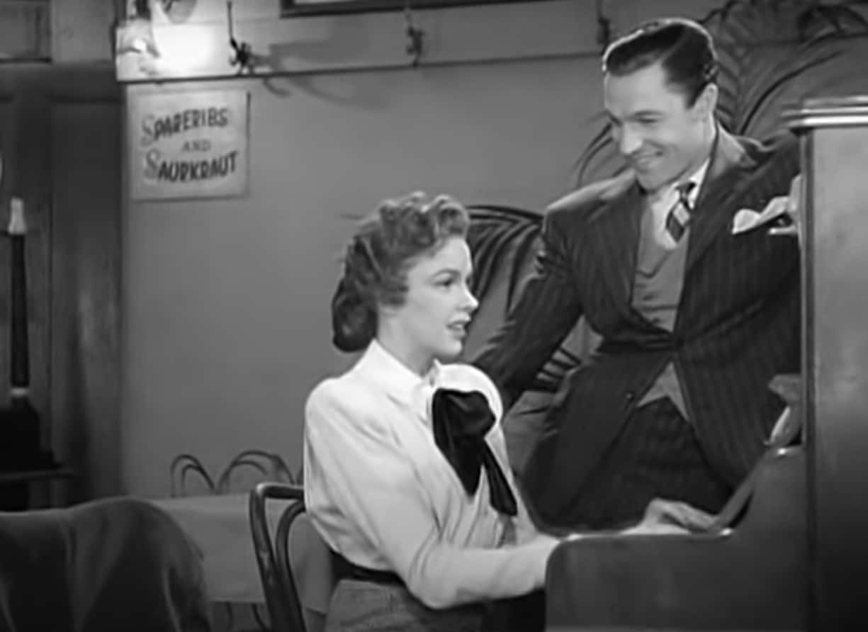 Judy Garland and Gene Kelly in For Me and My Gal playing a piano