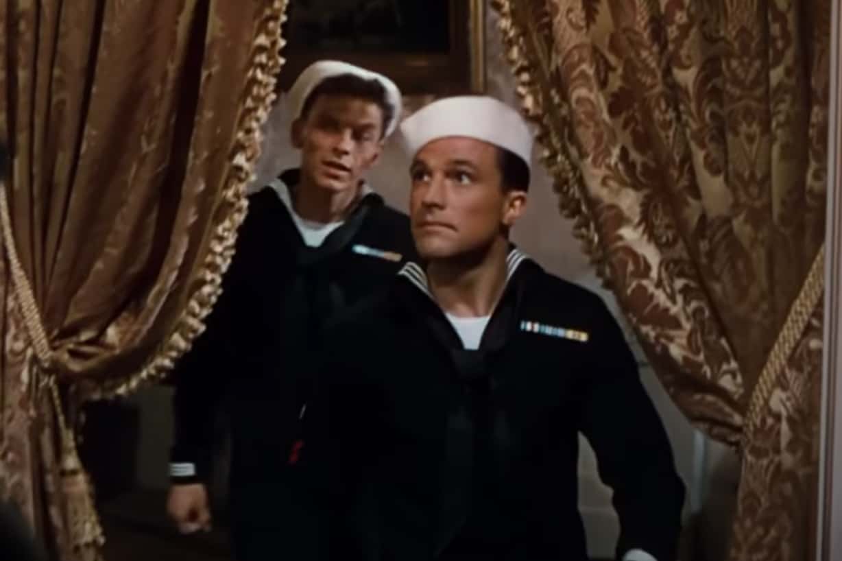 Gene Kelly in Anchors Aweigh walking somewhere