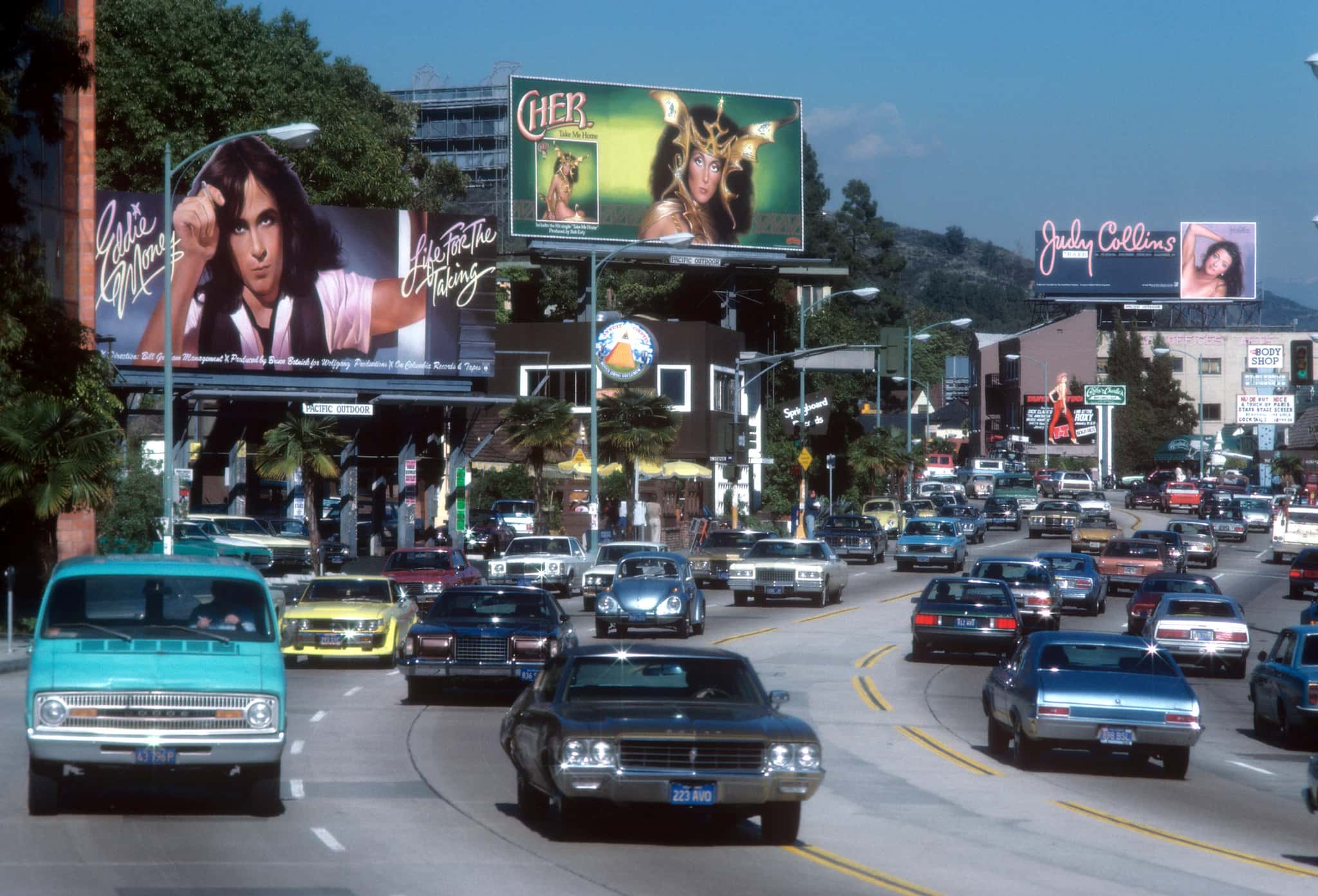The Sunset Strip with billboards for Cher, Eddie Money and Judy Collins