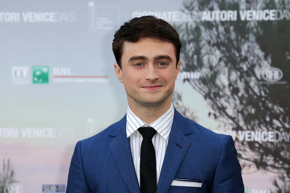 Daniel Radcliffe wearing a blue suit