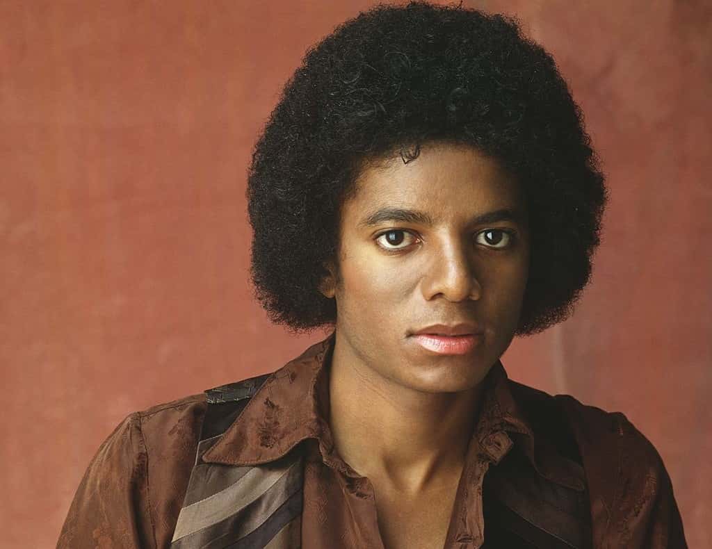 Portrait Photo of Michael Jackson wearing a brown shirt