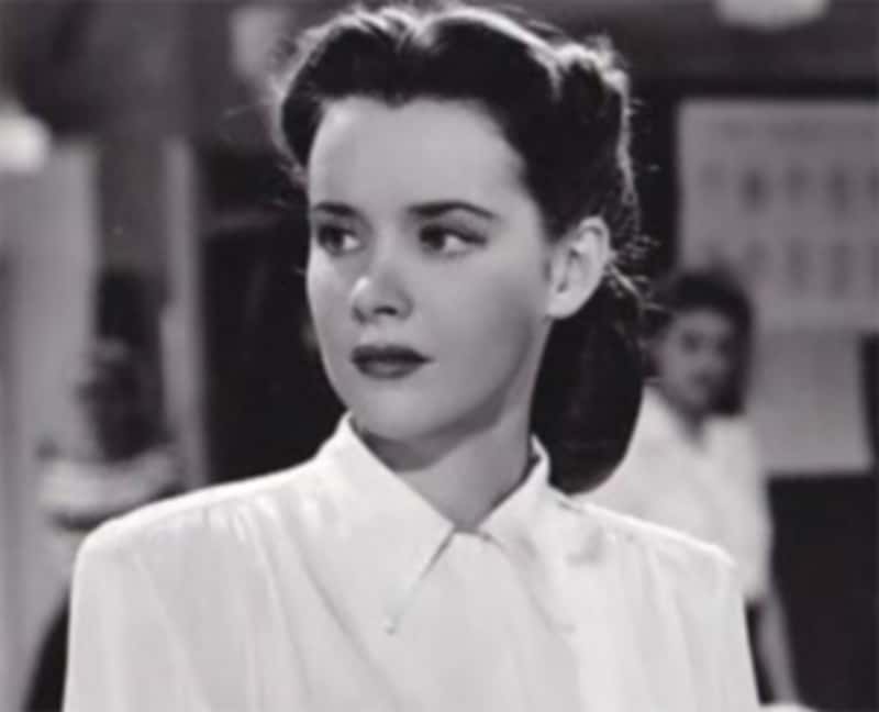 Susan Peters in white shirt