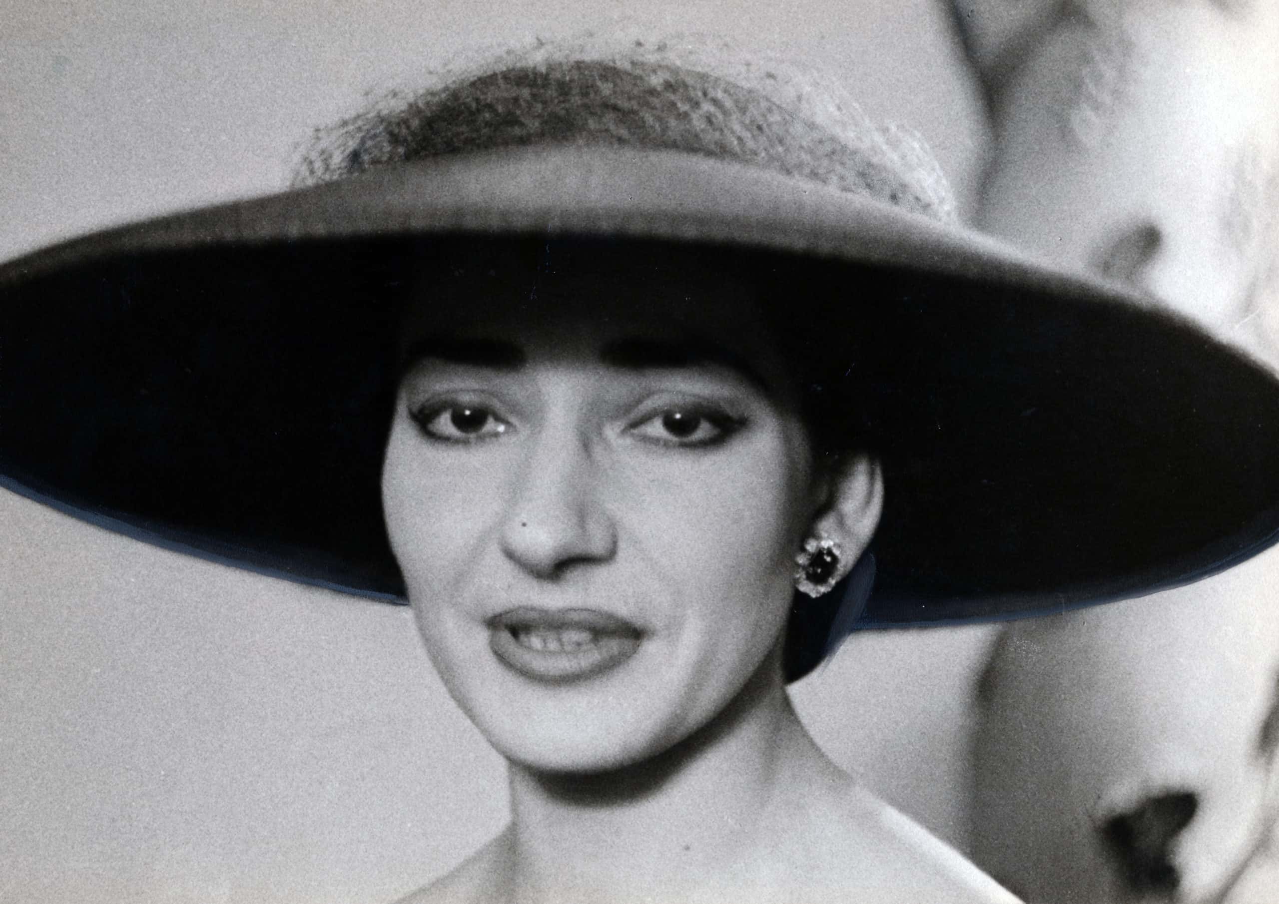 Portrait of Greek-born American soprano Maria Callas wearing a big hat