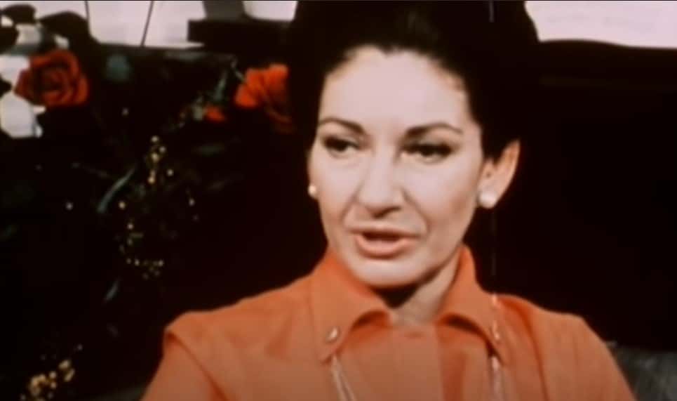 Portrait Photo of Maria Callas wearing red outfit, looking to the left