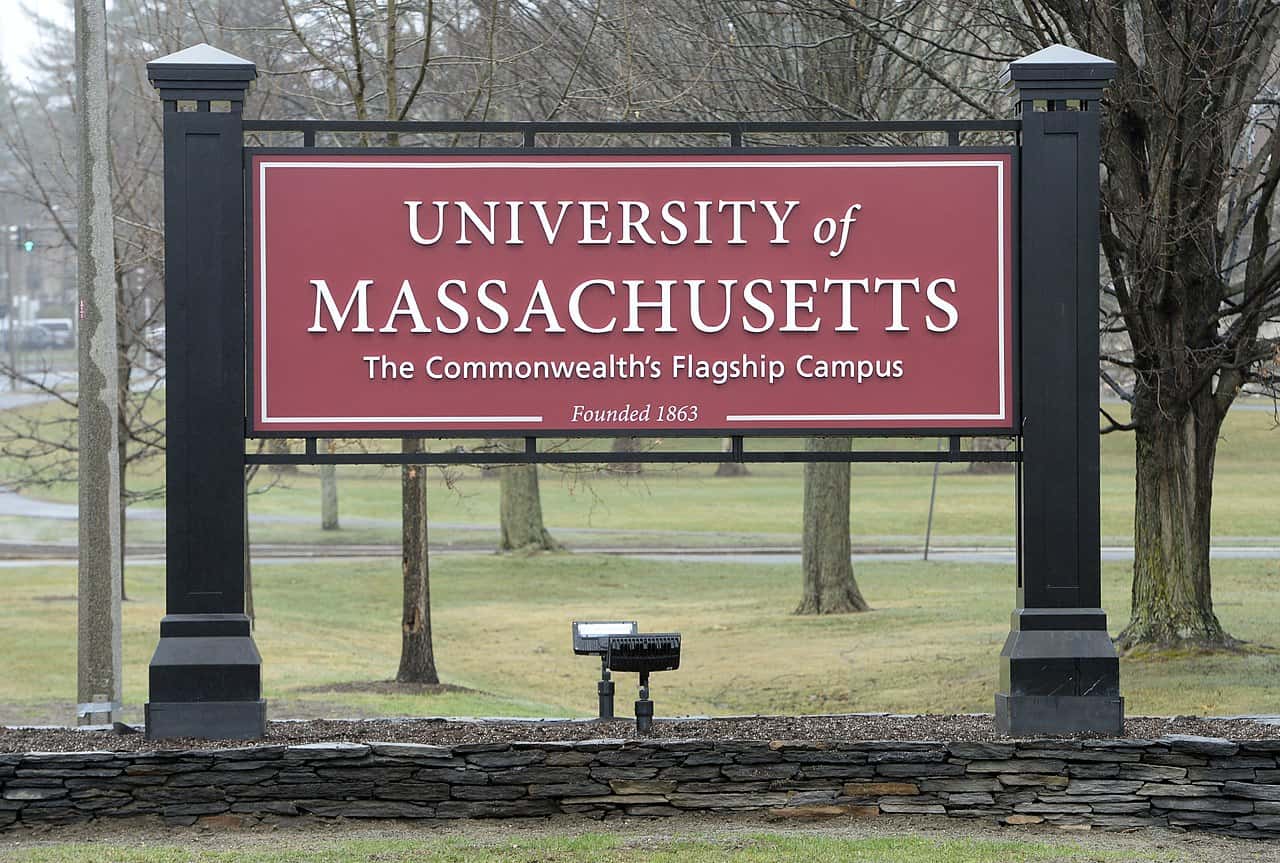 Close Up Photo of The west entry sign of the University of Massachusetts