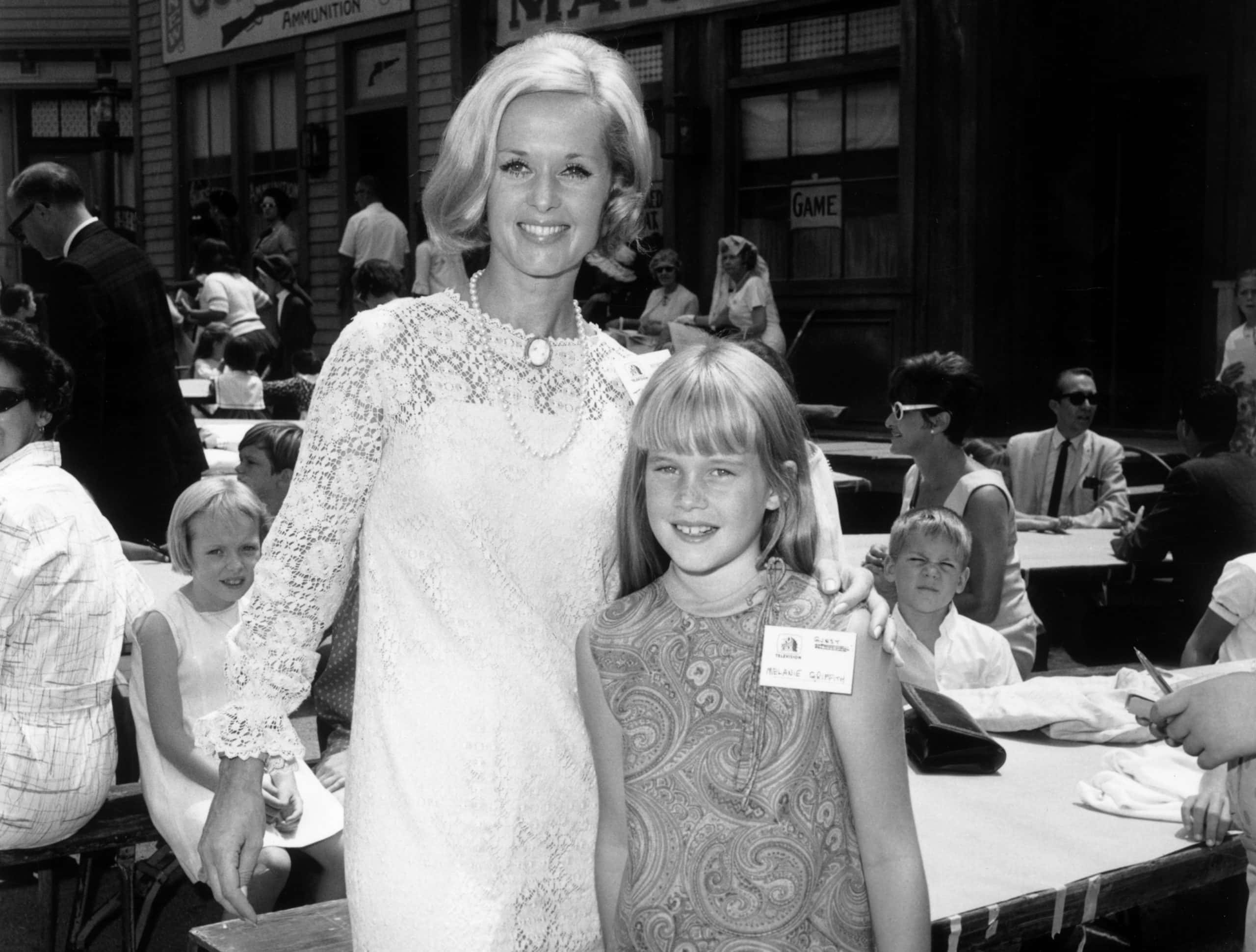 Tippi Hedren and her daughter, Melanie Griffith, at a children's party
