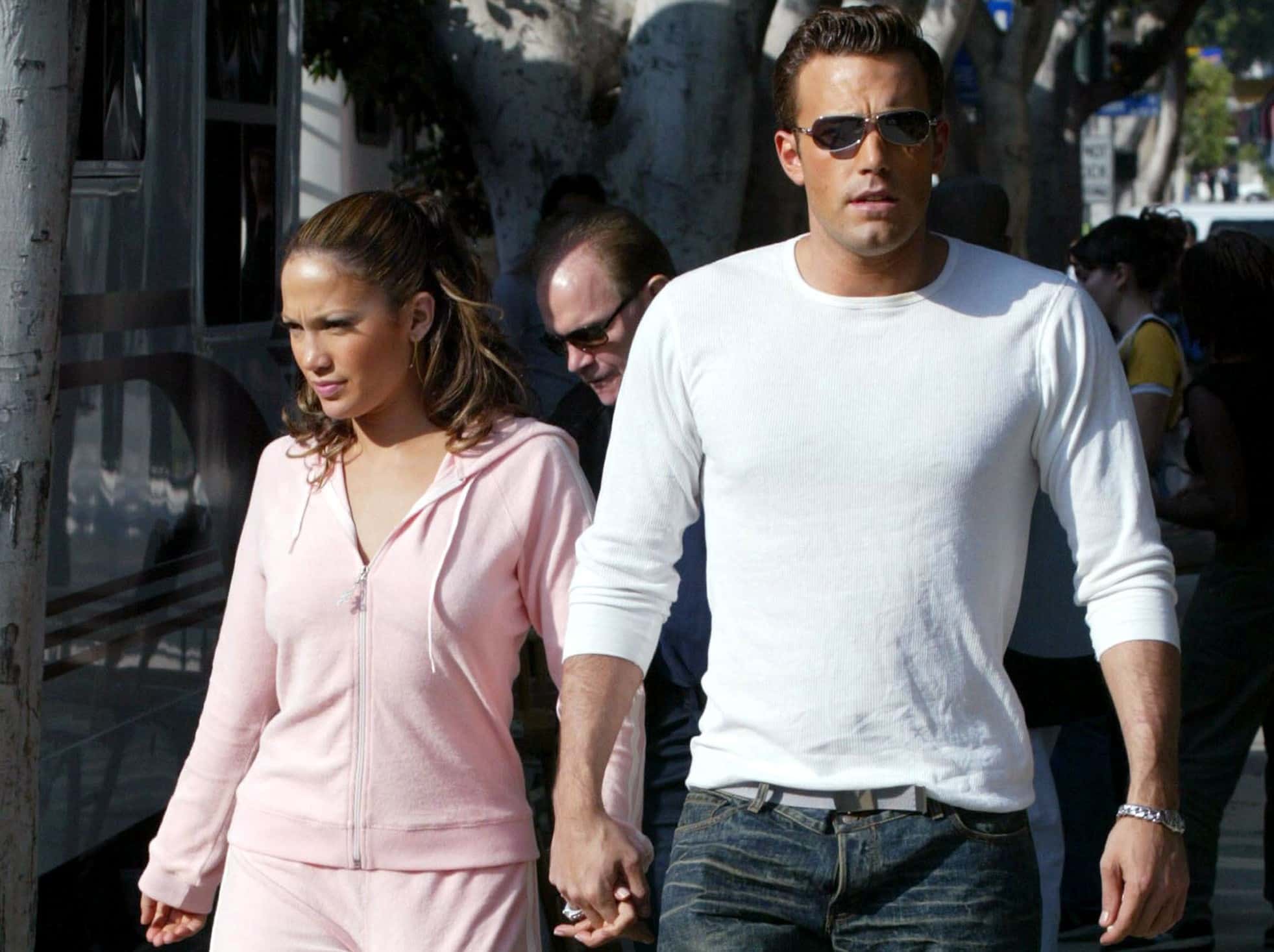 Actress/singer Jennifer Lopez and actor Ben Affleck hold hands
