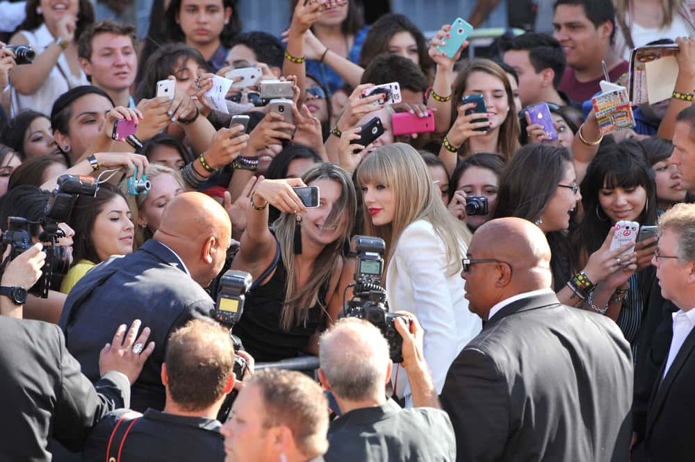 Taylor Swift at the MTV Video Music Awards at Staples Center, Los Angeles. September, wearing a white outfit