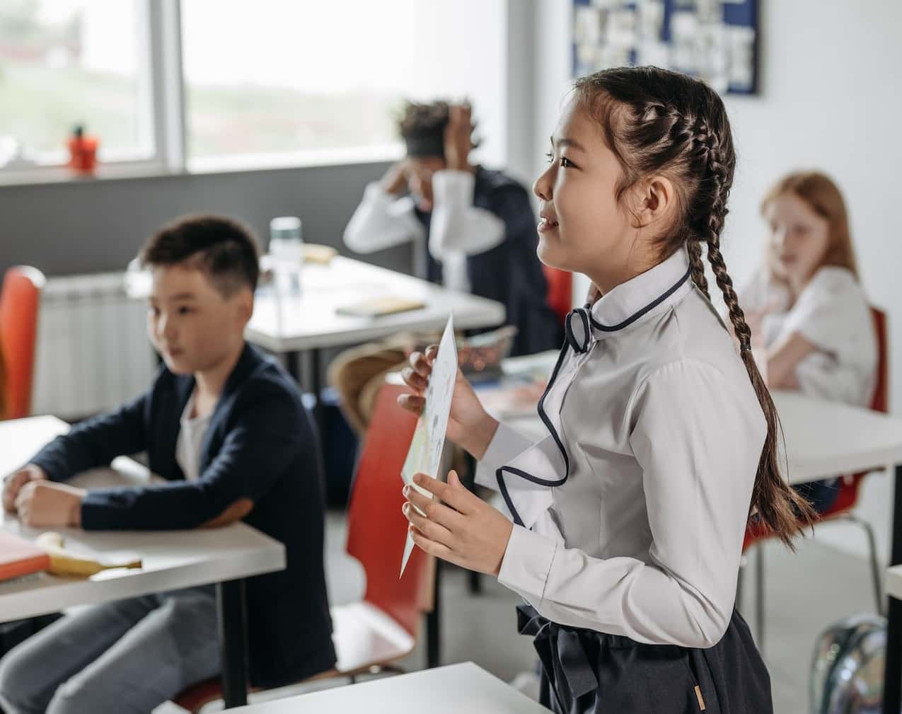 Girl at school talking.