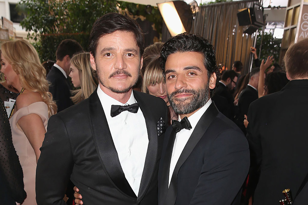 Actors Pedro Pascal and Oscar Isaac attend the 73rd Annual Golden Globe Awards