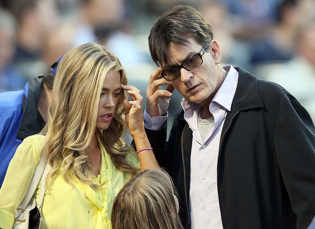 Denise Richards and Charlie Sheen look for their seats - 2012