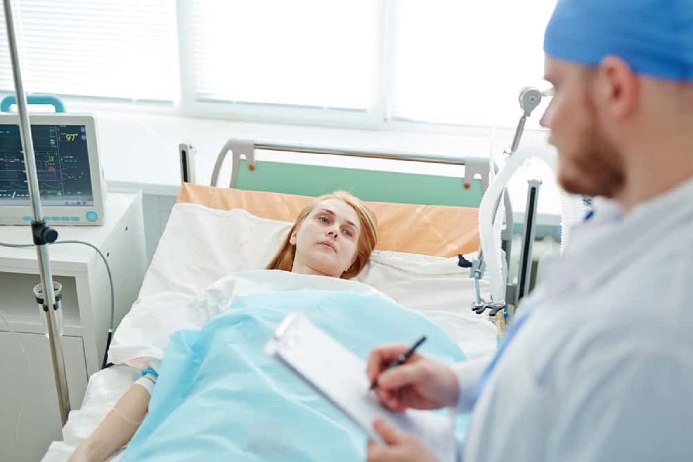 Woman in hospital bed