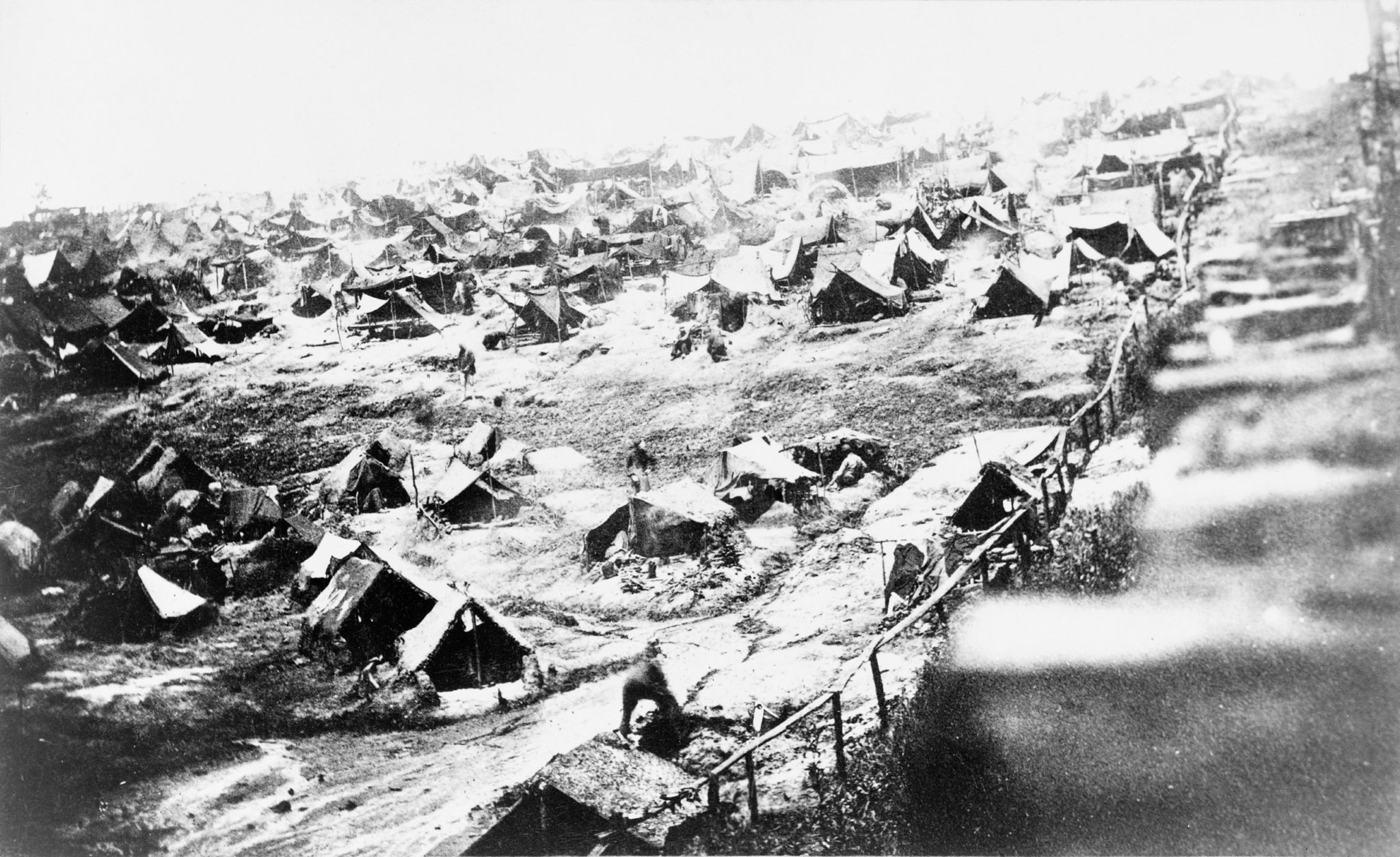 Andersonville Prison, showing prisoners in tents