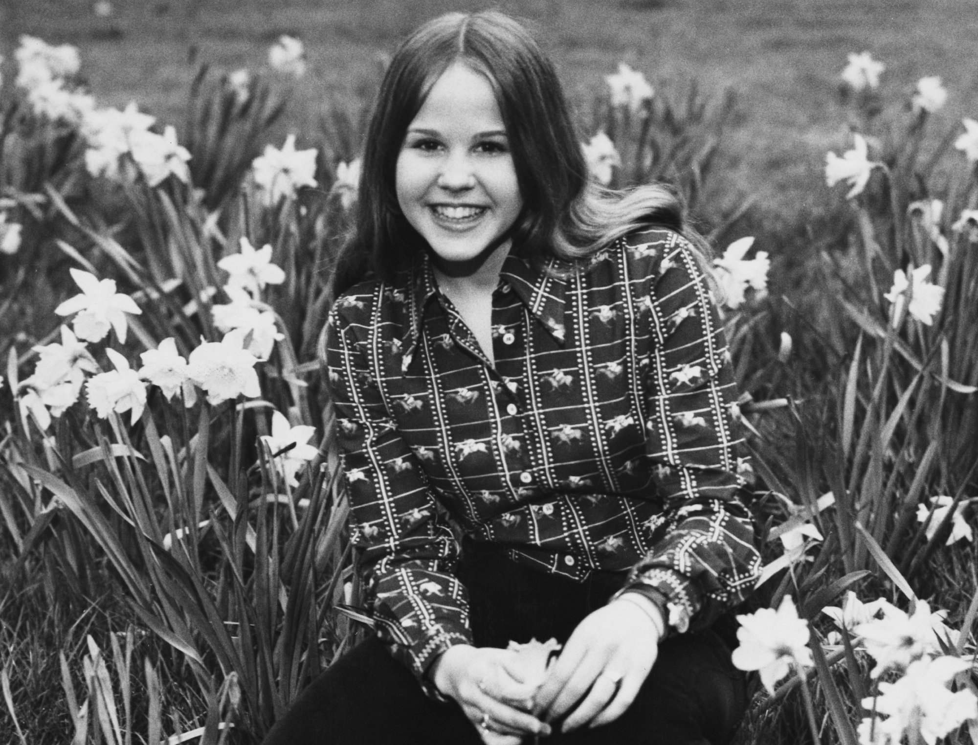 Linda Blair portrait looking at the camera in Kensington Gardens, London