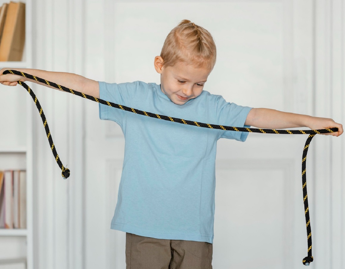 Kid playing with rope