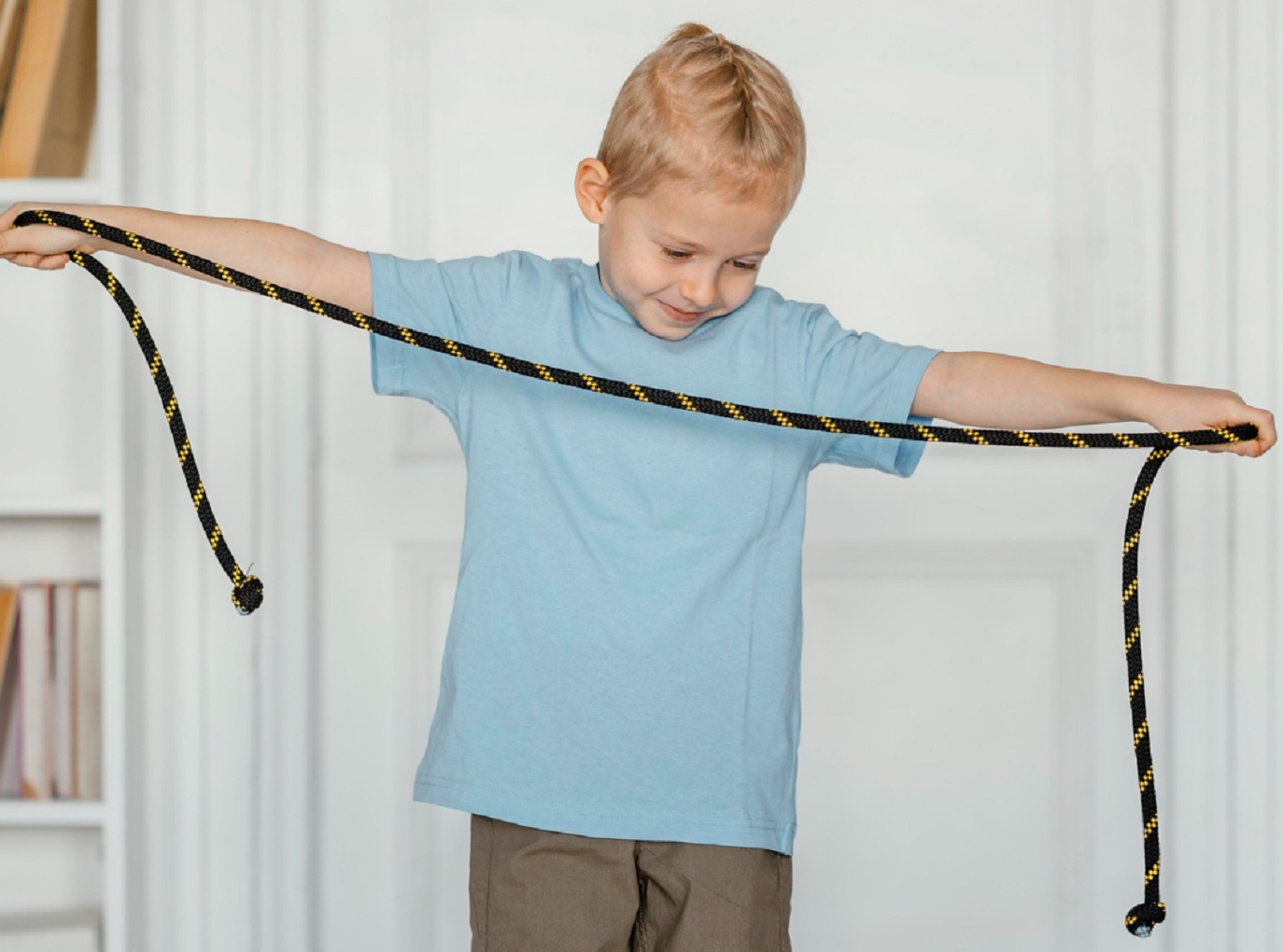 Kid holding a rope