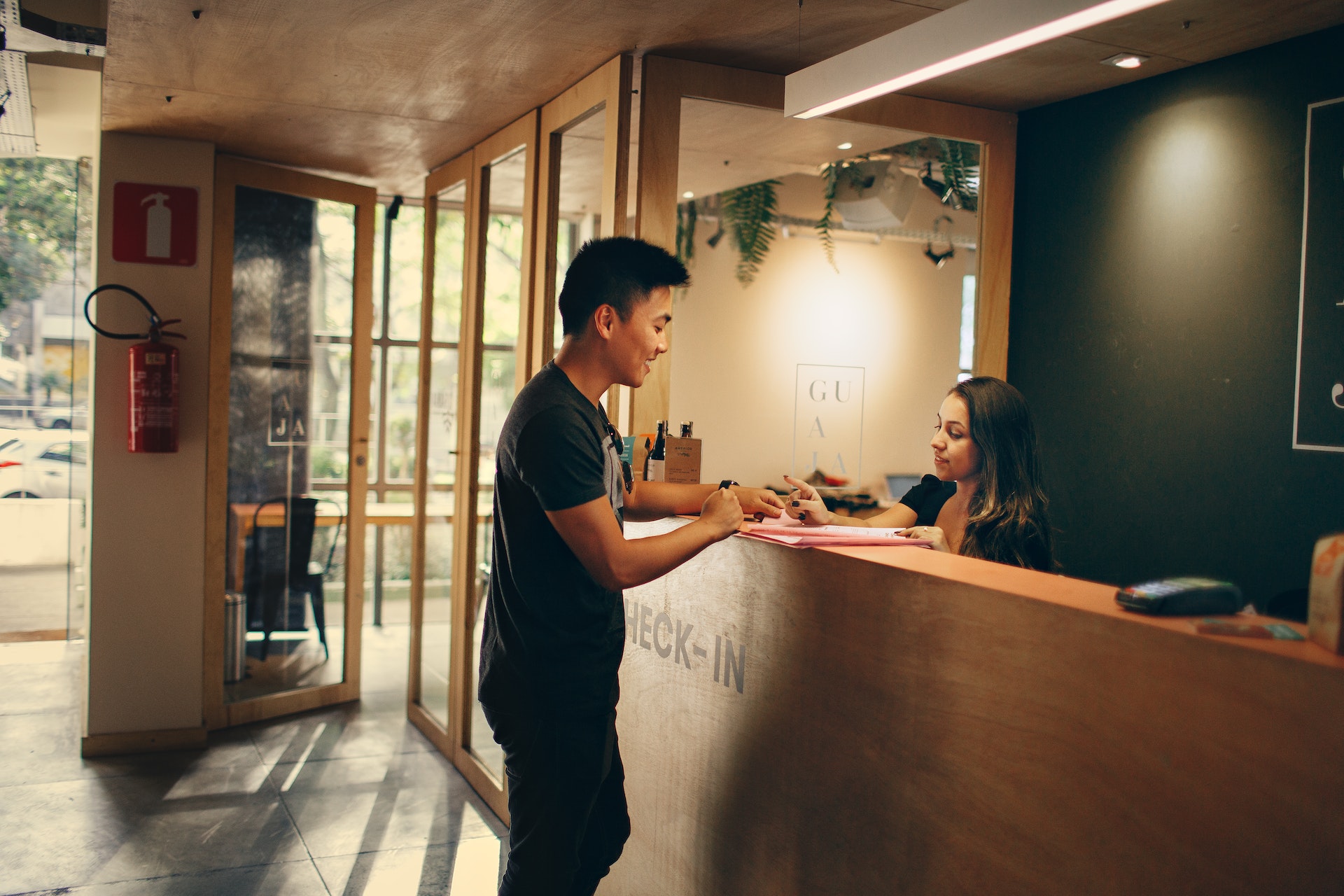 Receptionist working at the desk