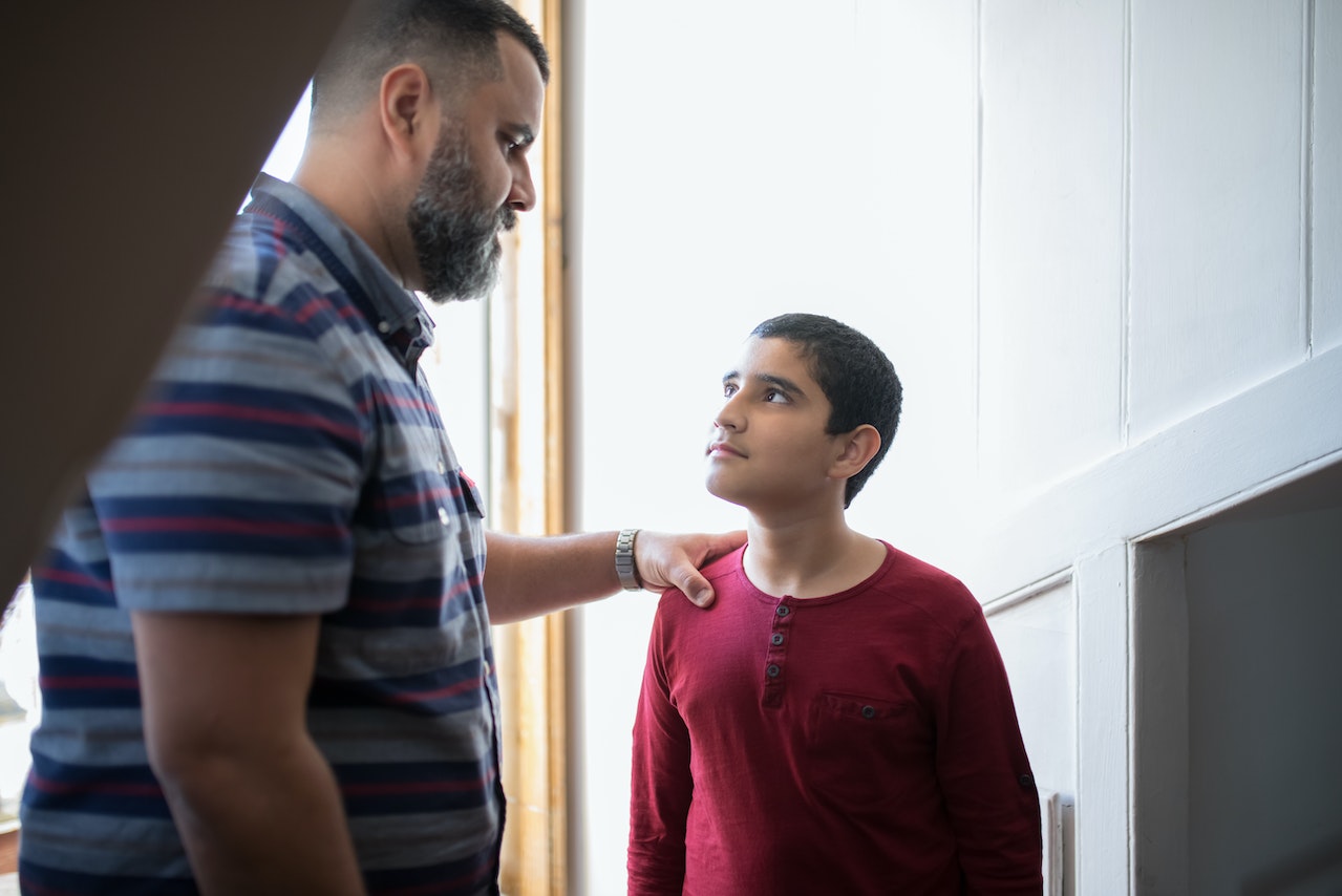 Father talking with son