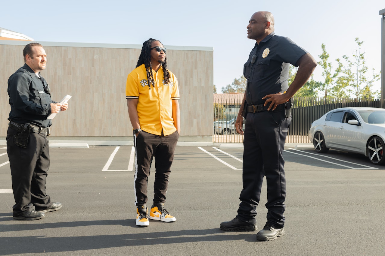 Police talking with a man