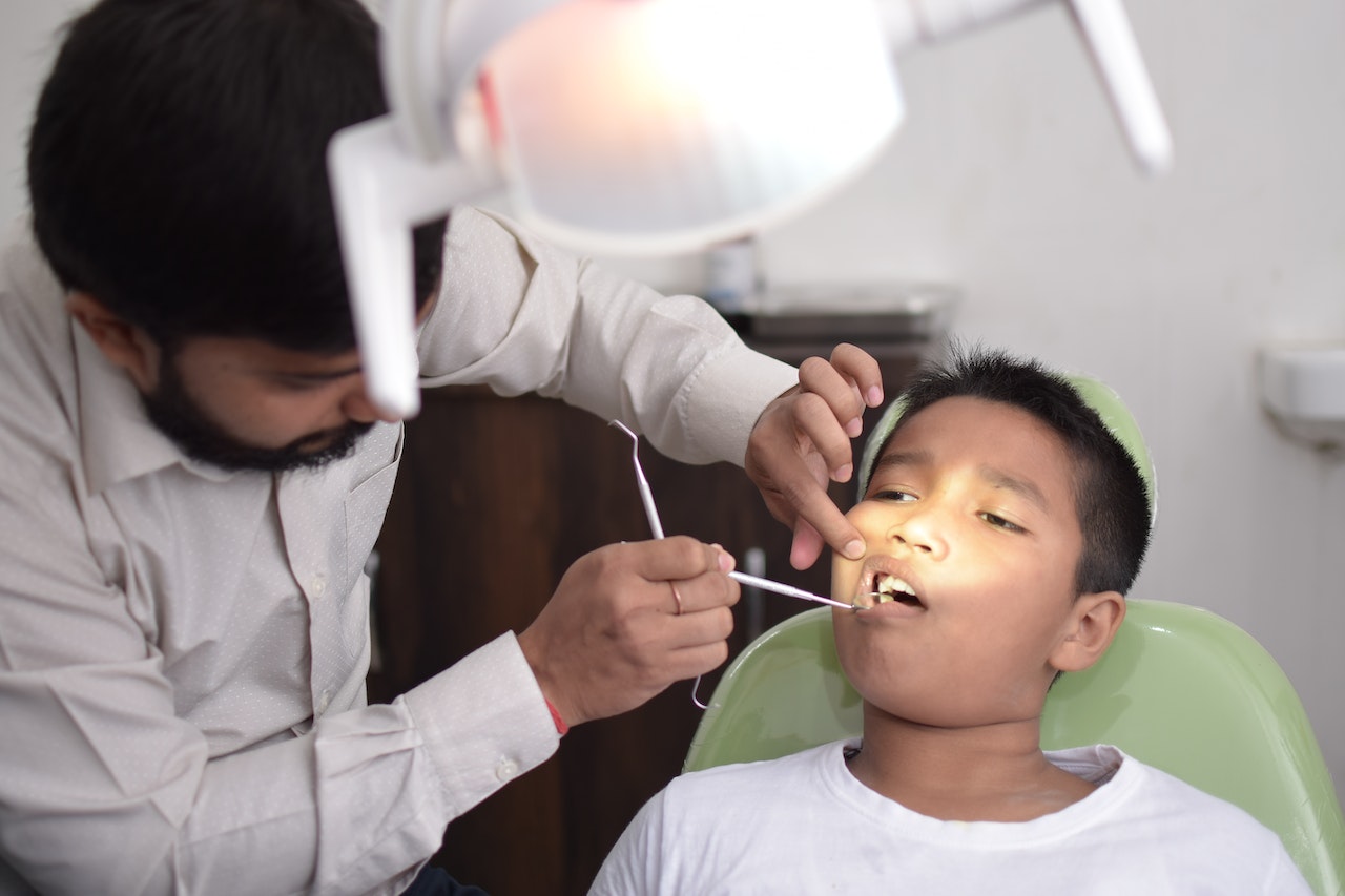 Kid at dentist