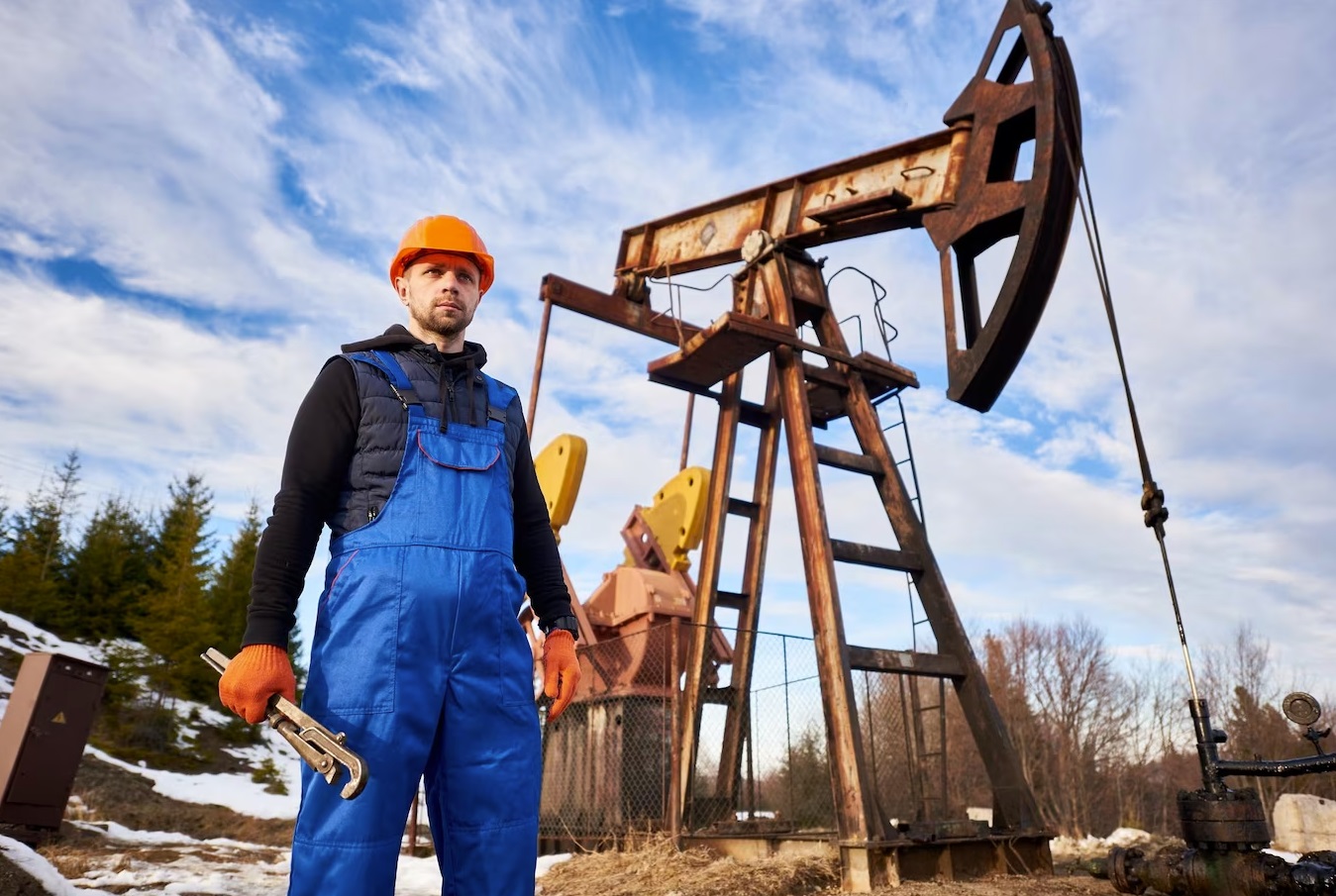 Man front of oil pump 
