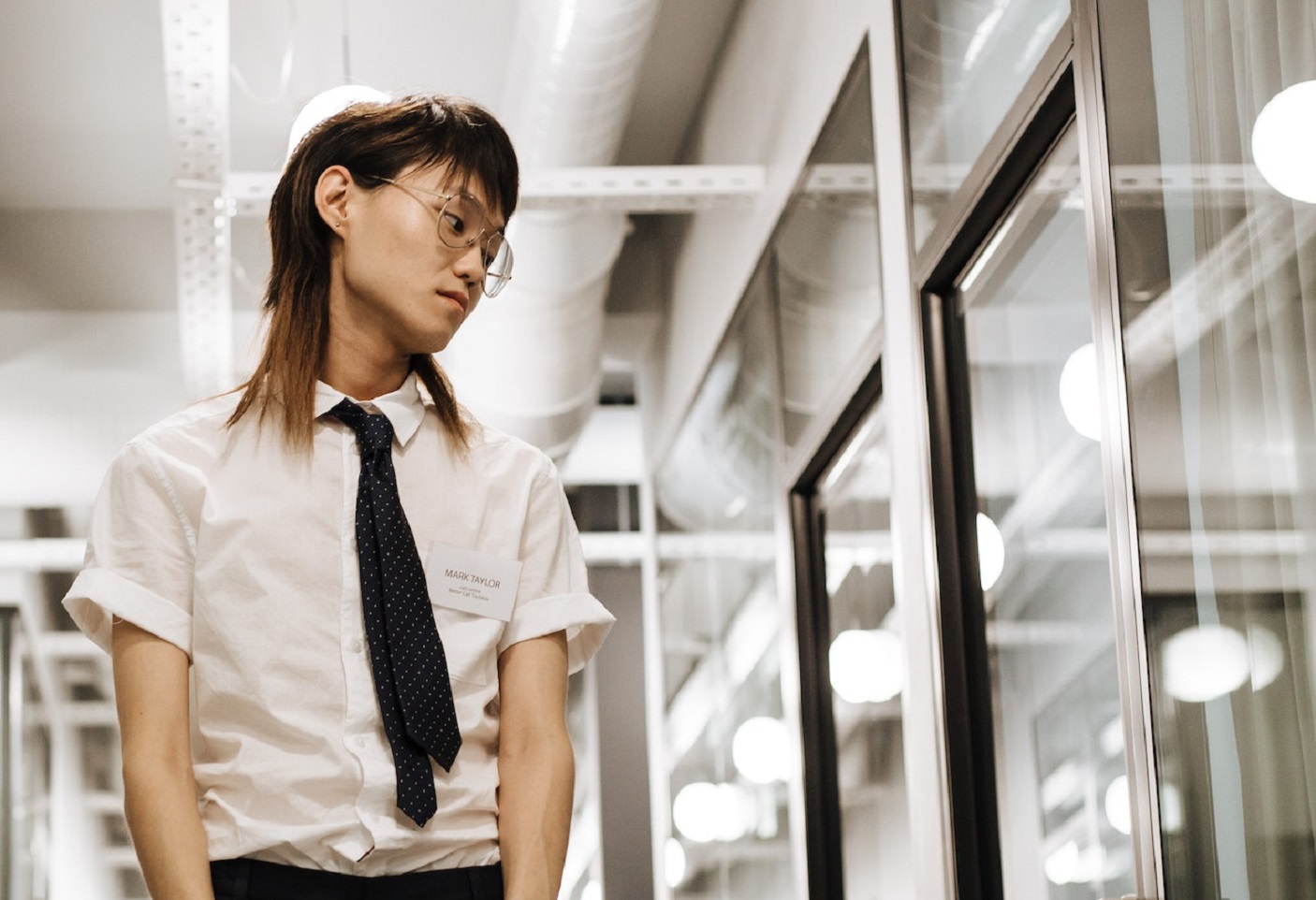 Man stand in front of an office.