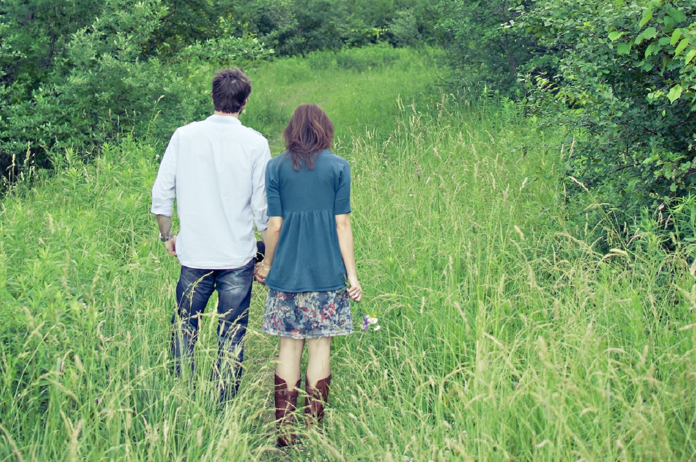 Couple walking in the woods