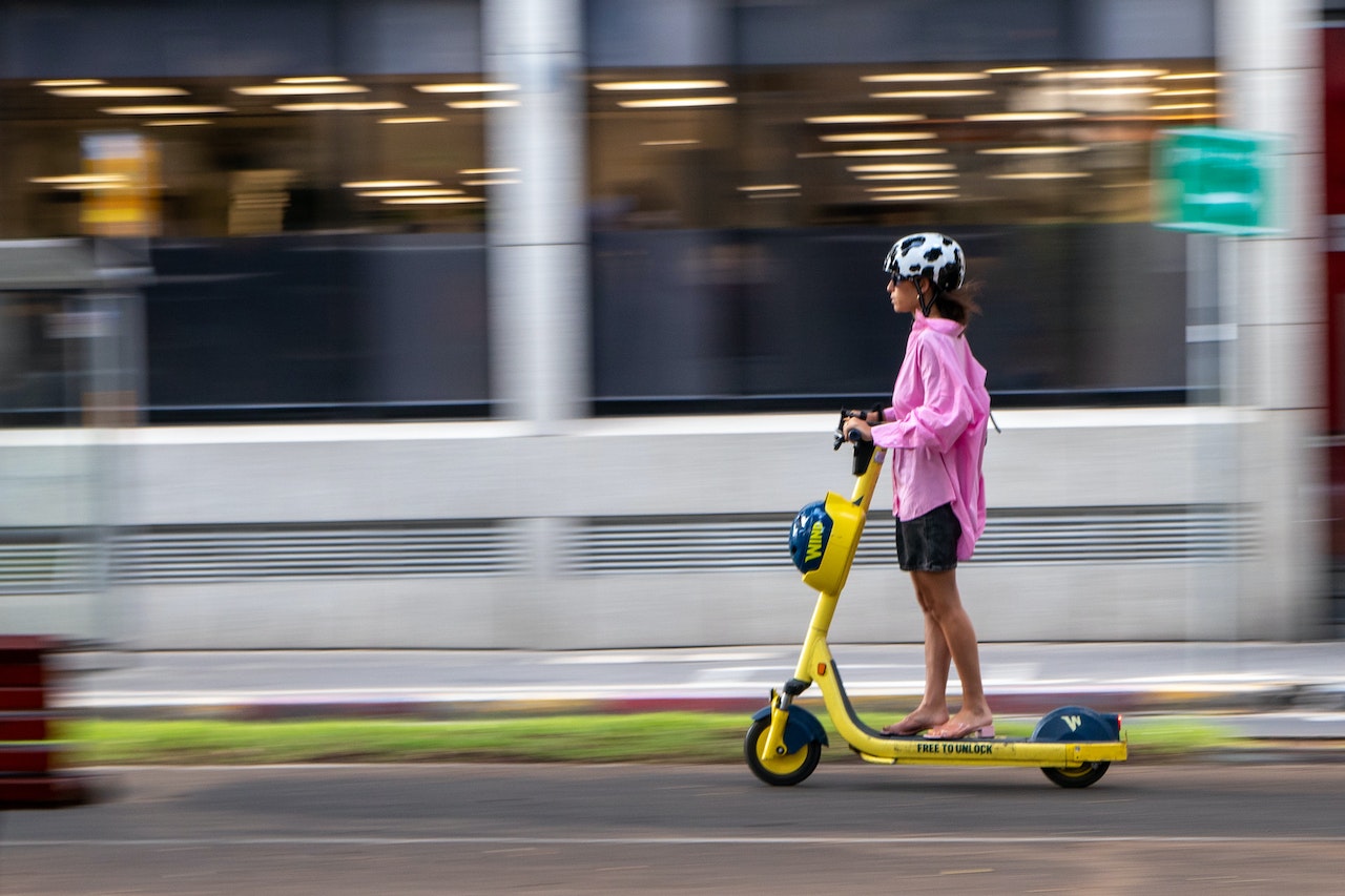 Woman on electric scooter