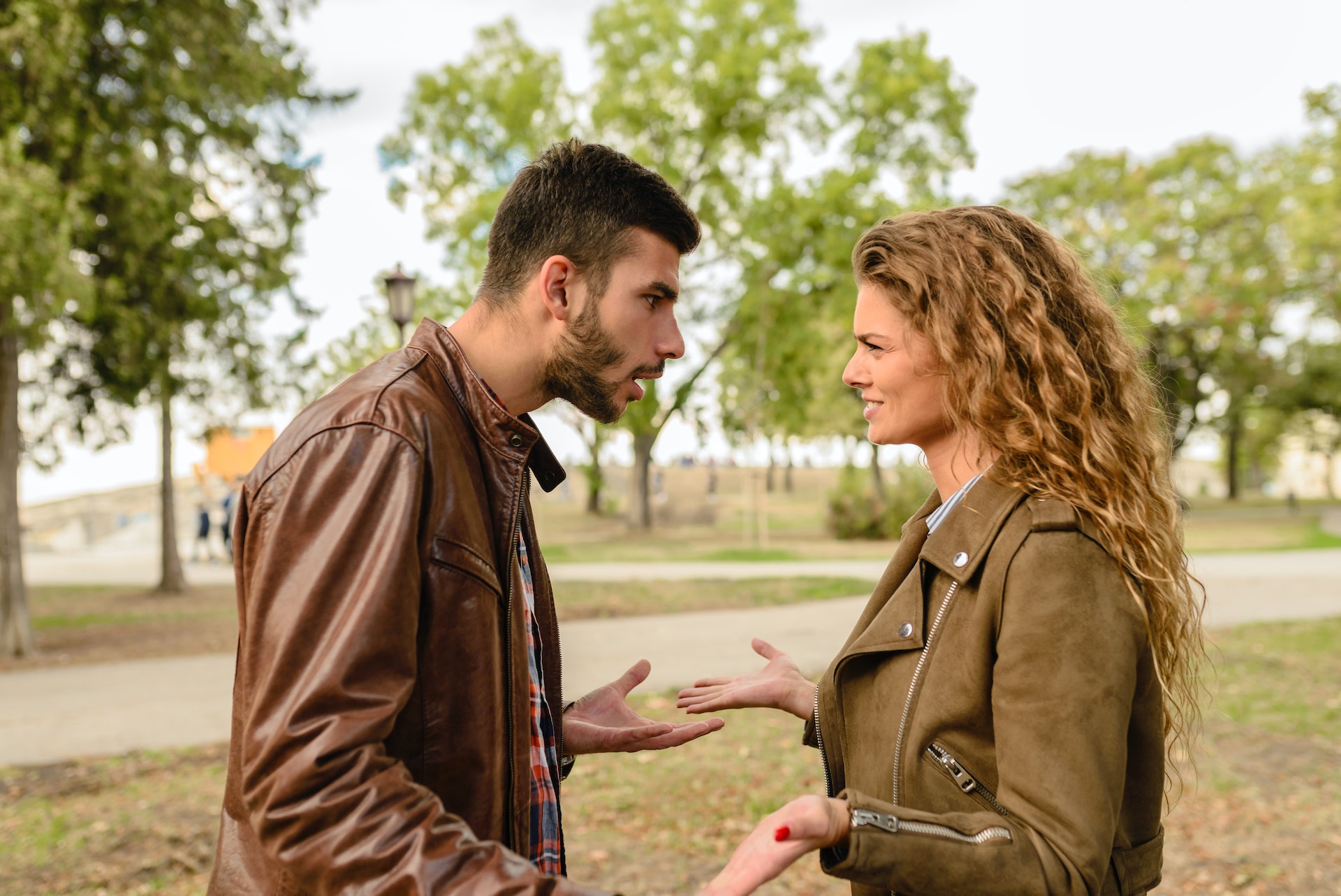 Man and woman having argument at a park 