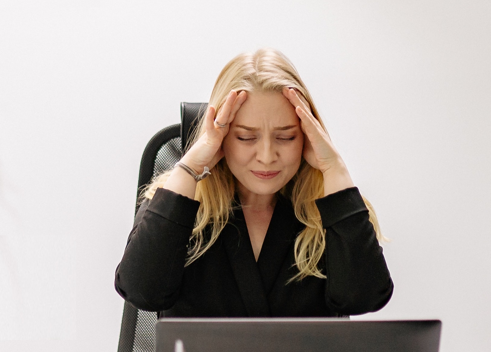 Upset woman in office