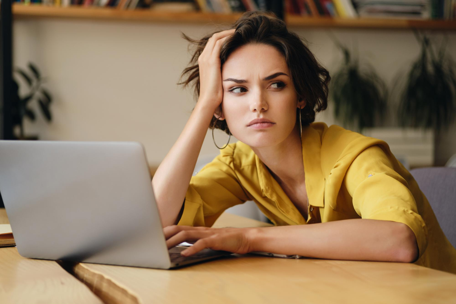 Upset woman on her desk