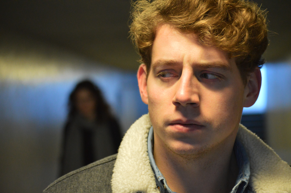 Man in jacket being stalked