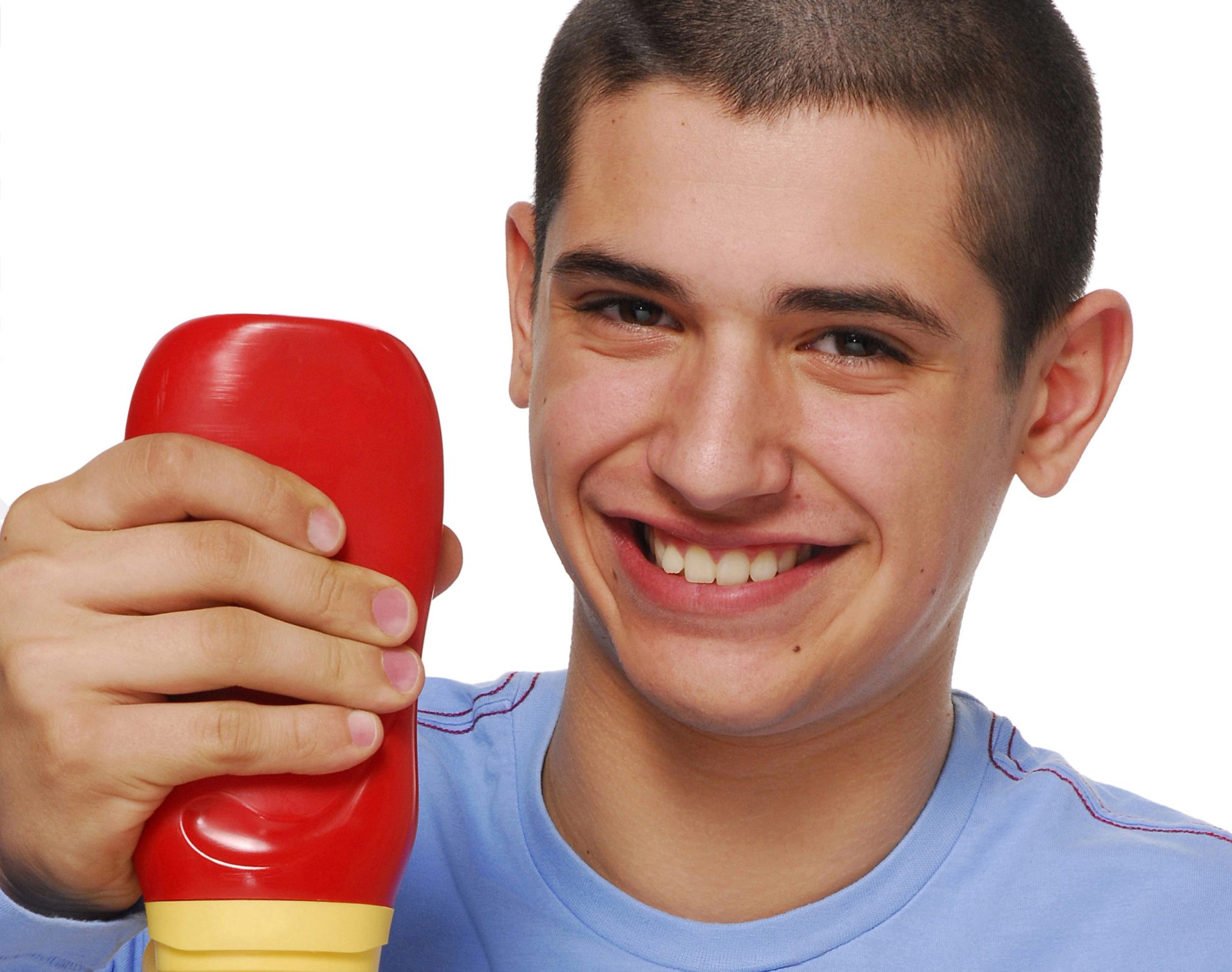 Man holding bottle of ketchup